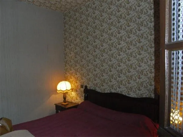 Bed in Auberge de la Poste