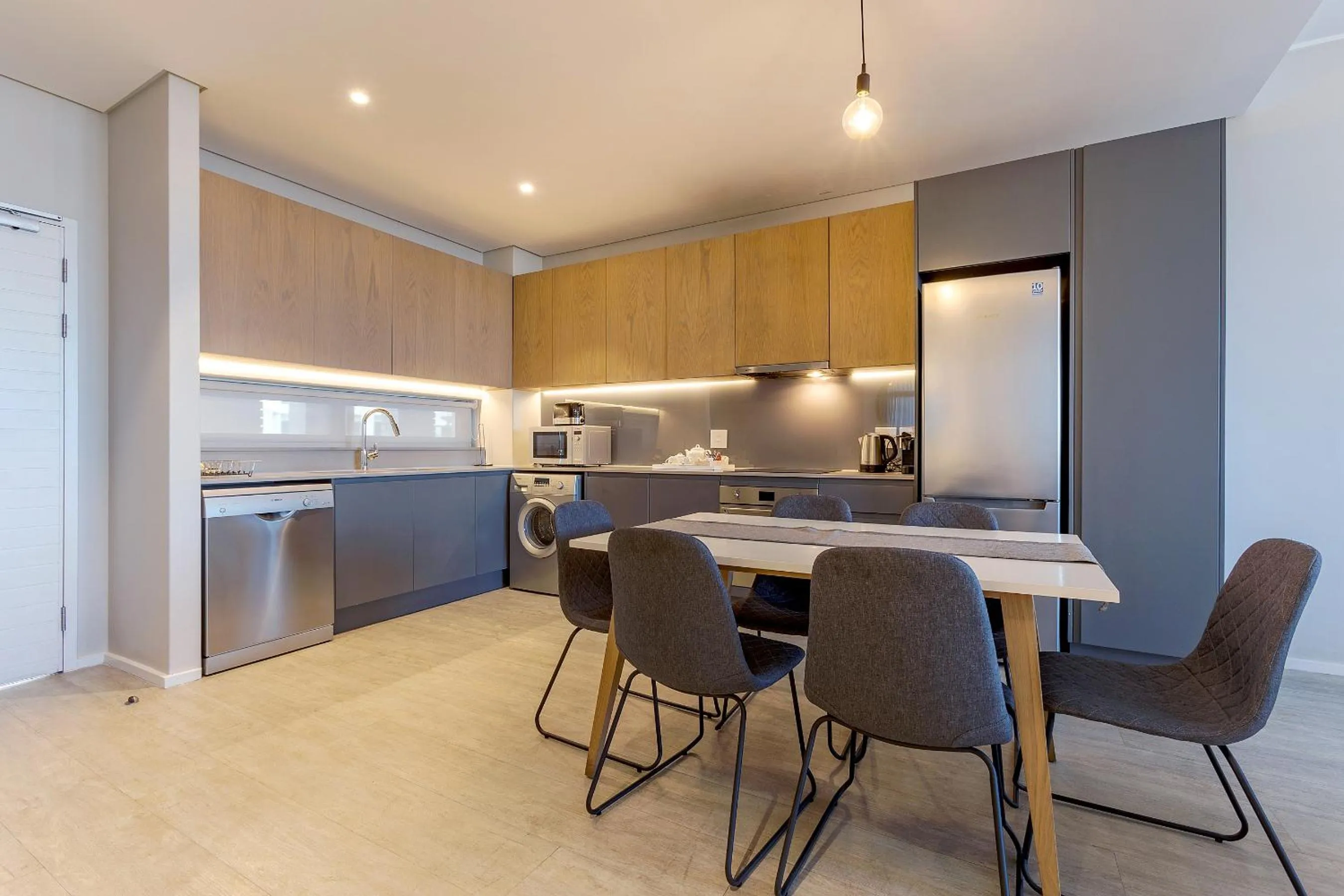 Kitchen or kitchenette in Axis Luxury Apartments by Century City Hotels
