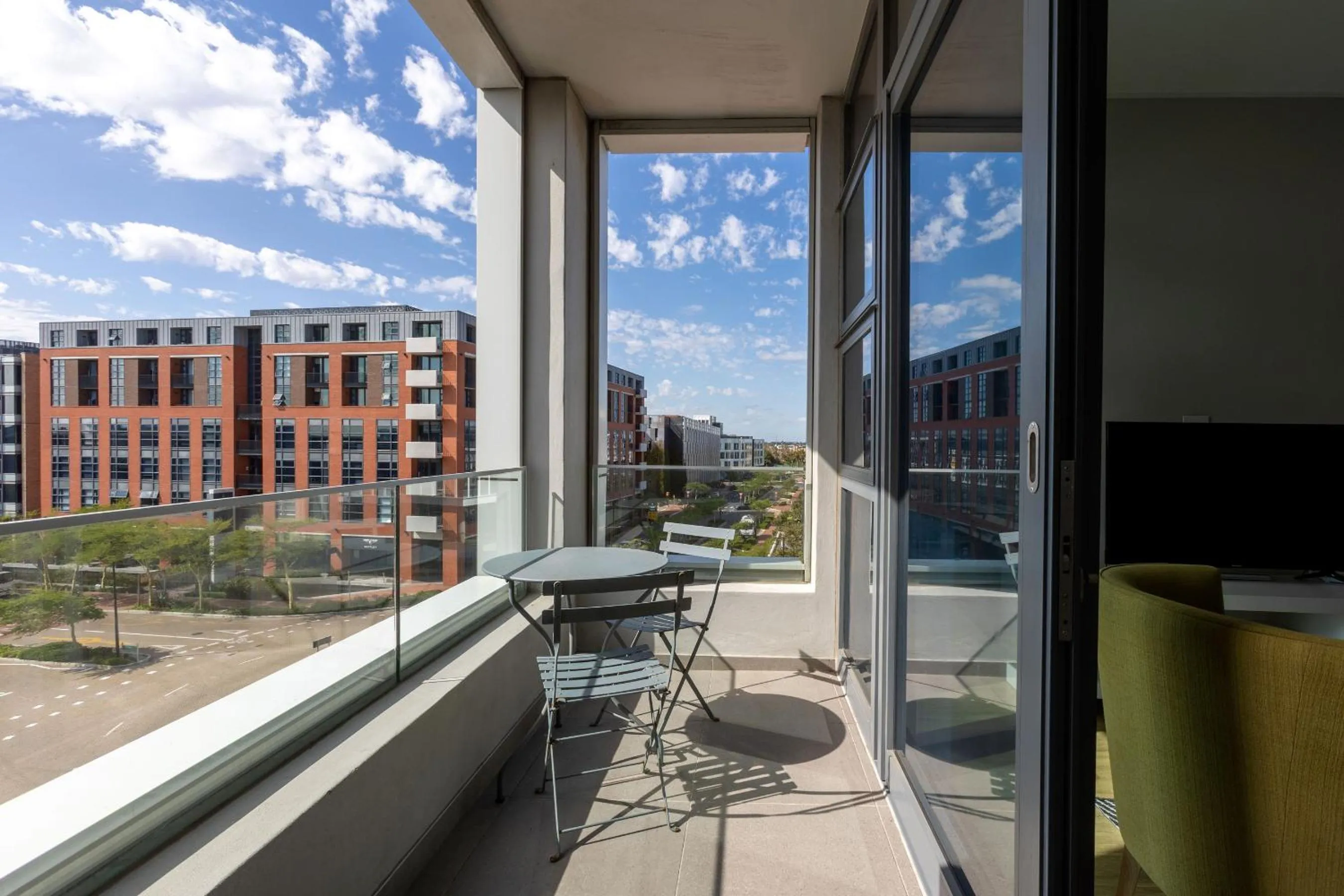 Balcony/Terrace in Axis Luxury Apartments by Century City Hotels