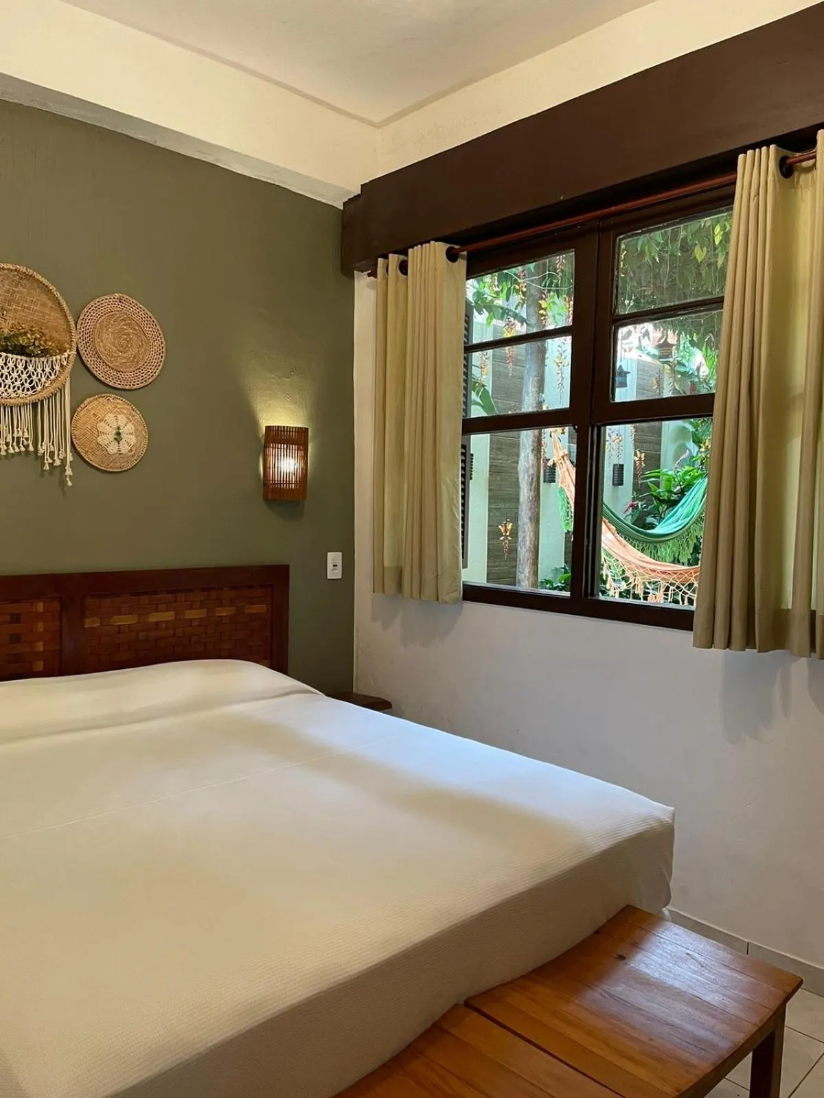 Bed in Pousada Aroeira