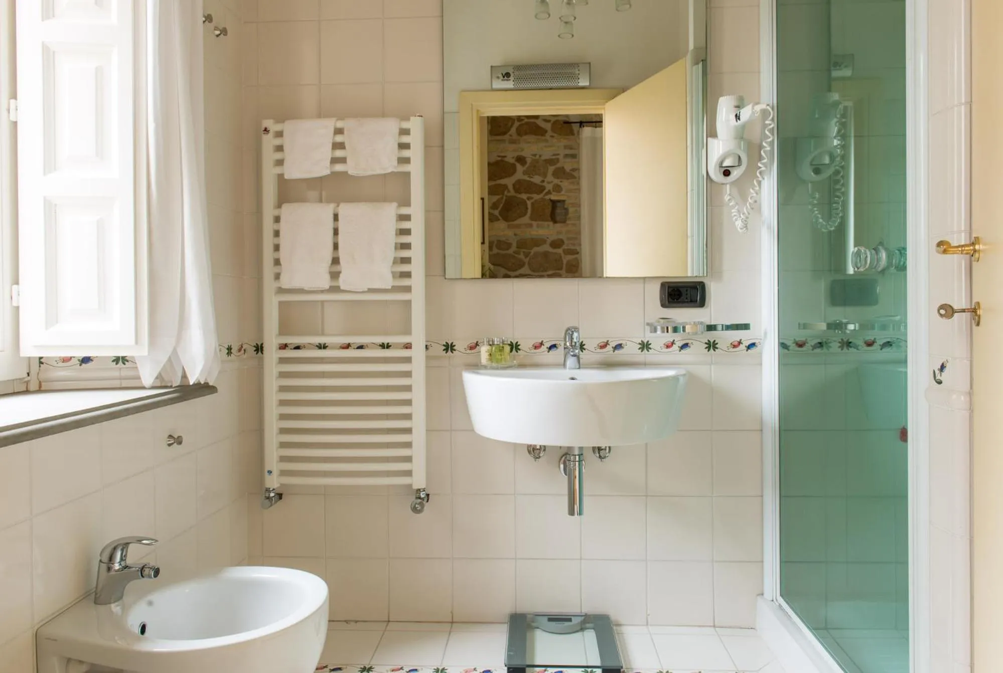 Bathroom in Palm Gallery Hotel