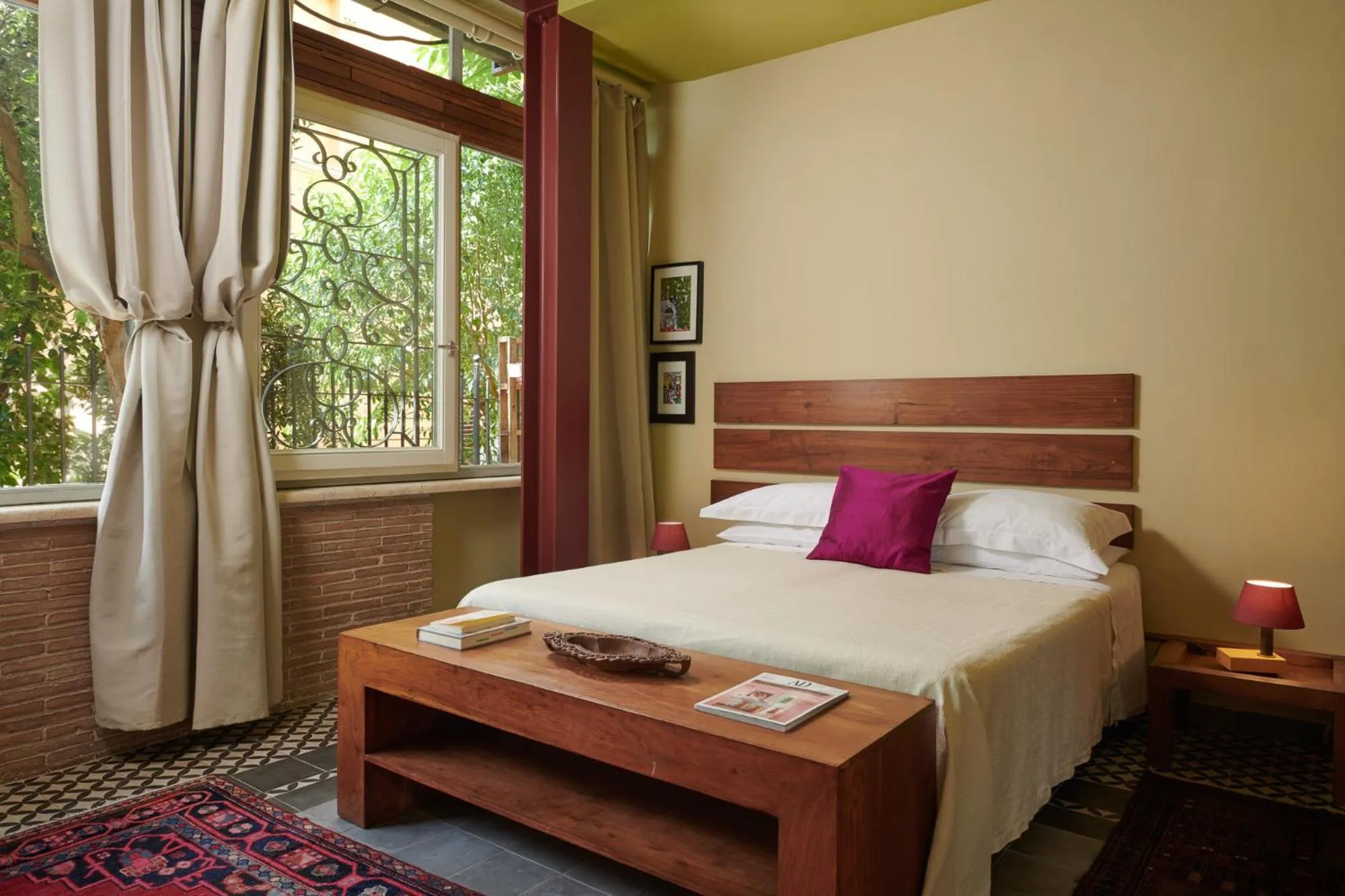 Bed in Palm Gallery Hotel