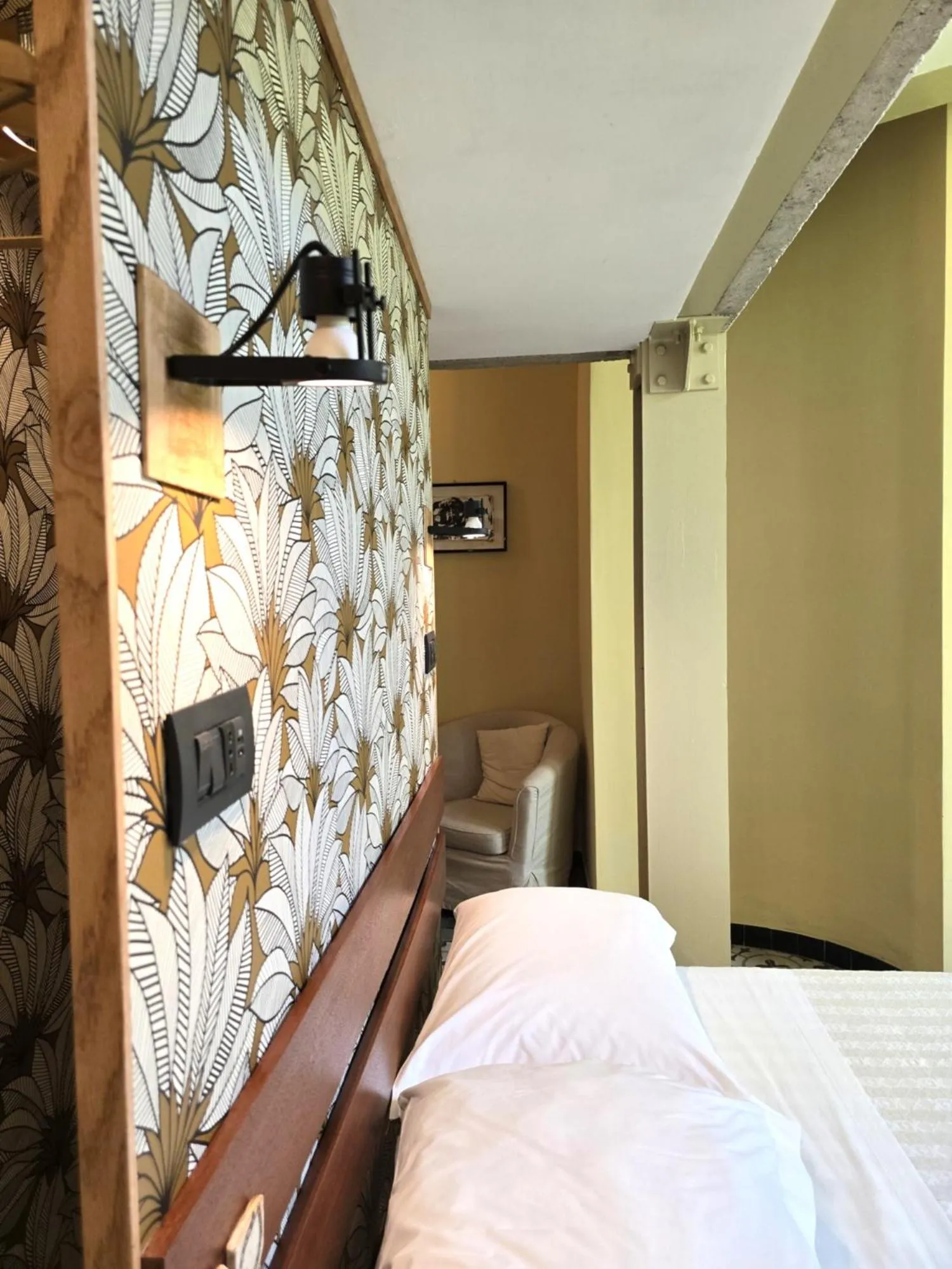 Decorative detail, Bed in Palm Gallery Hotel