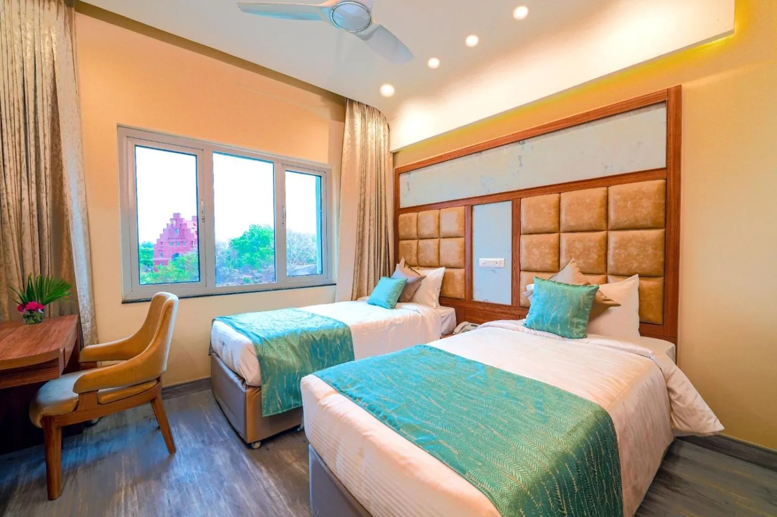 Photo of the whole room, Bed in Ramoji Film City- Tara Comfort Hotel