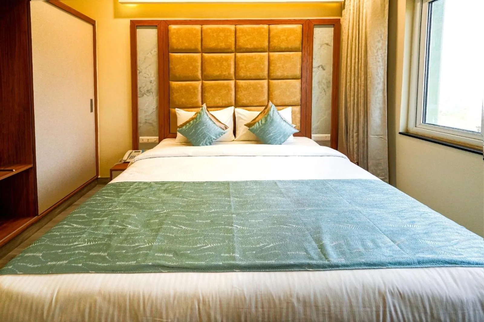 Photo of the whole room, Bed in Ramoji Film City- Tara Comfort Hotel