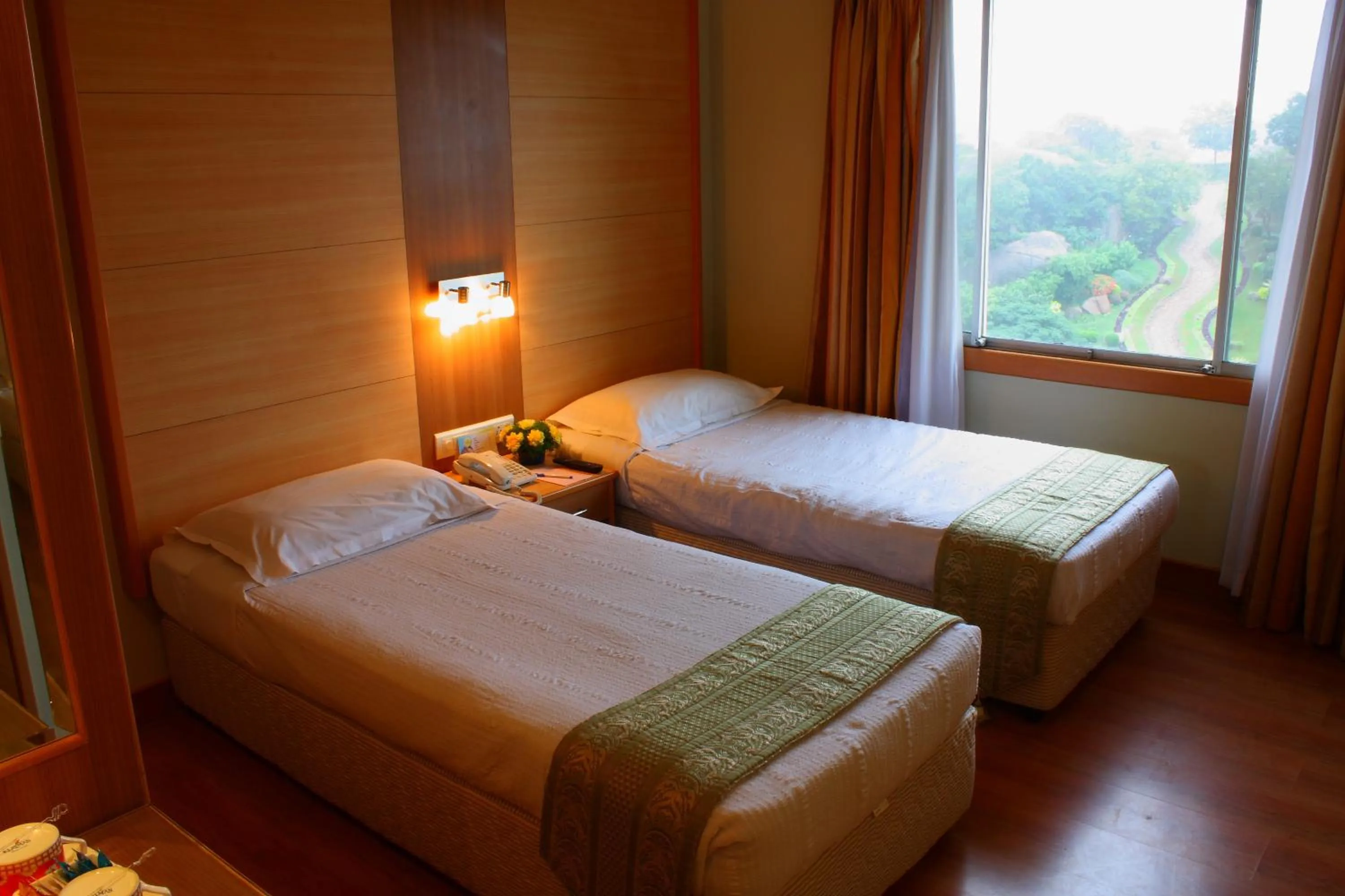 Bedroom, Bed in Ramoji Film City- Tara Comfort Hotel