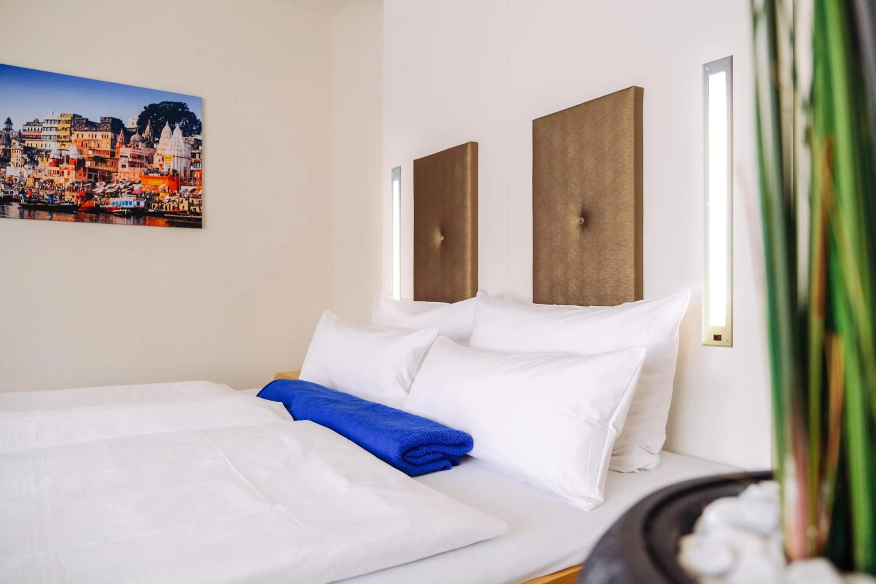 Bed in Hotel Global Inn