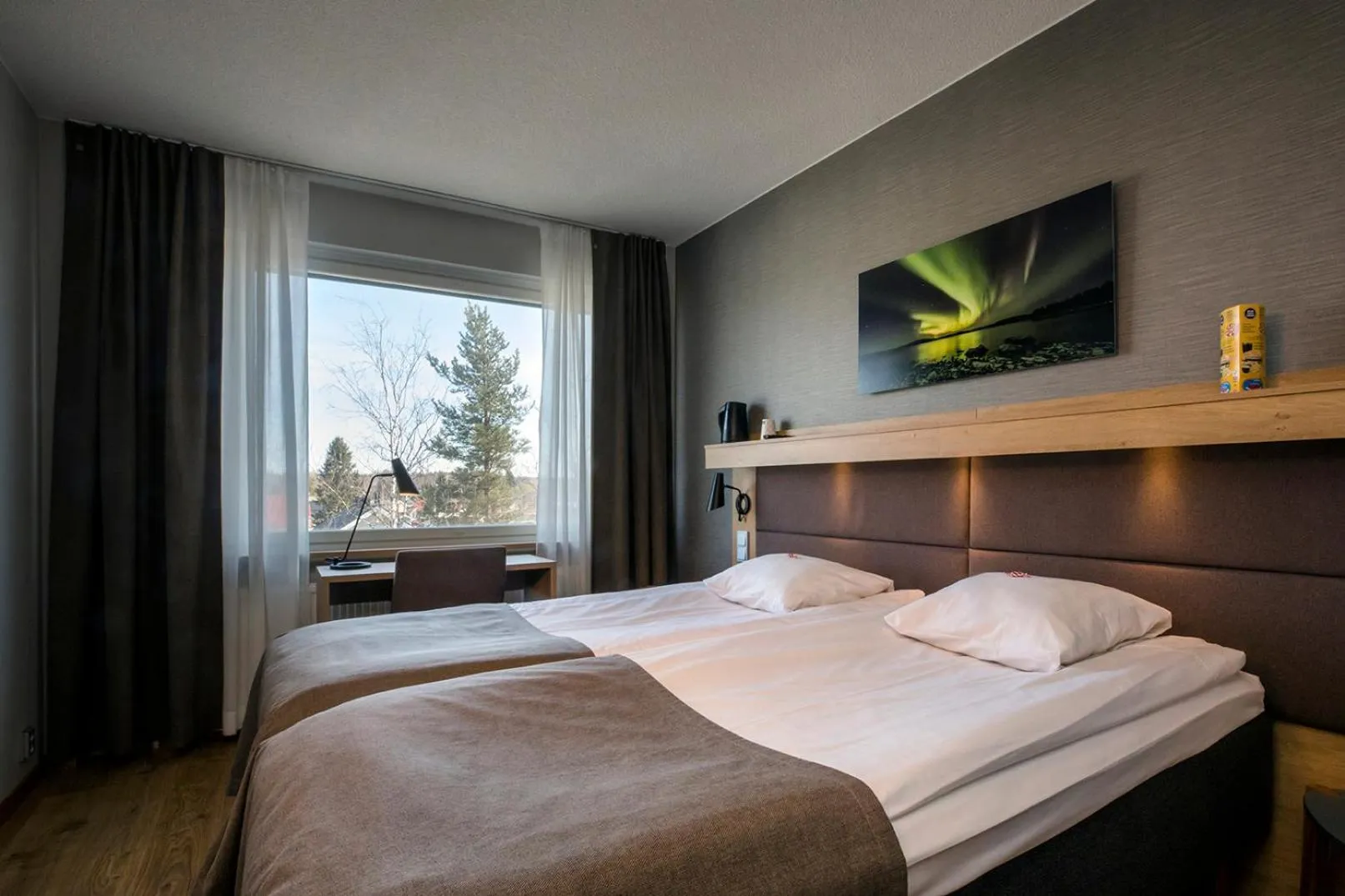 Photo of the whole room, Bed in Hotelli Toivola