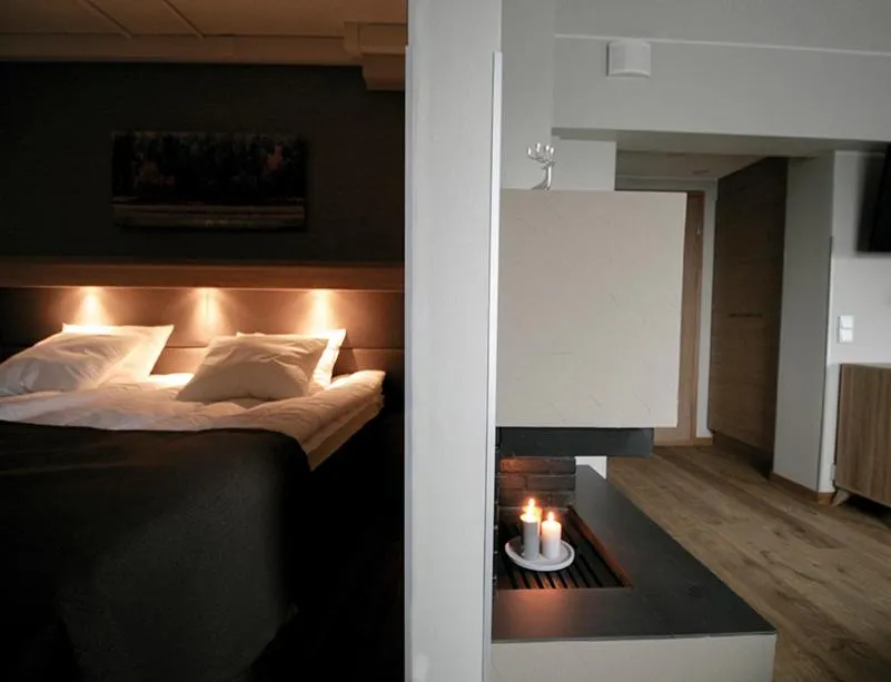 Photo of the whole room, Bed in Hotelli Toivola