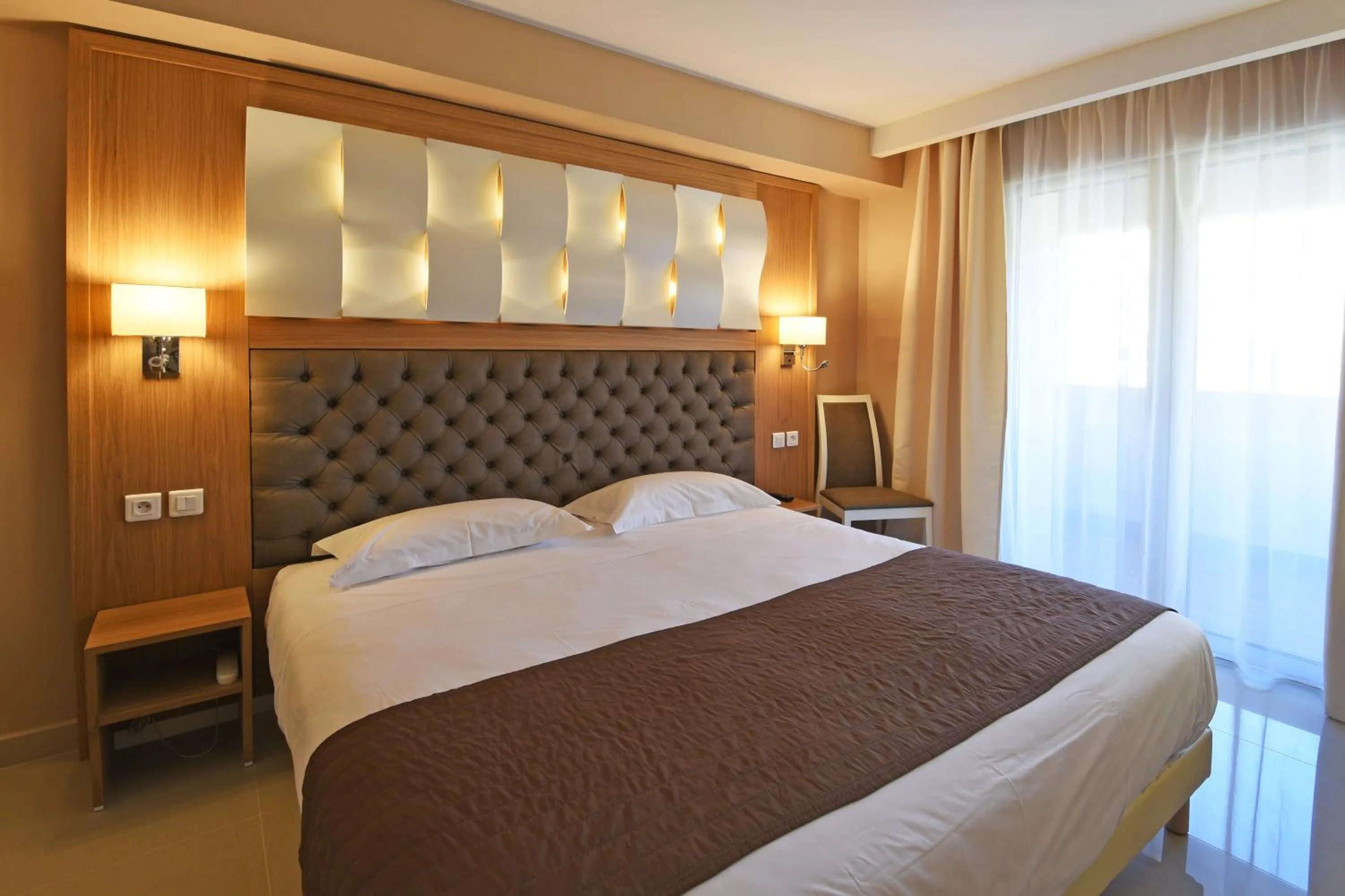 Bed in Hotel Tettola