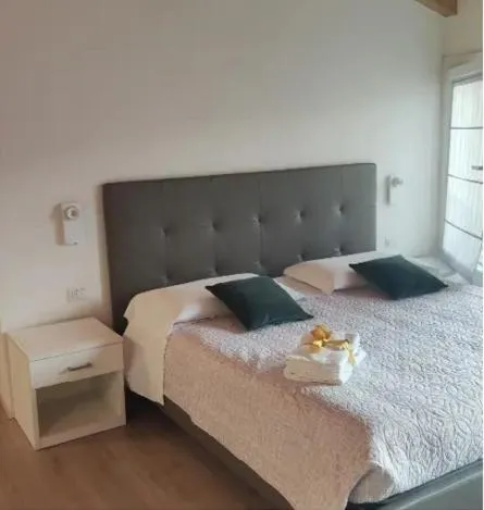 Bed in Terra Ferma Rooms&More