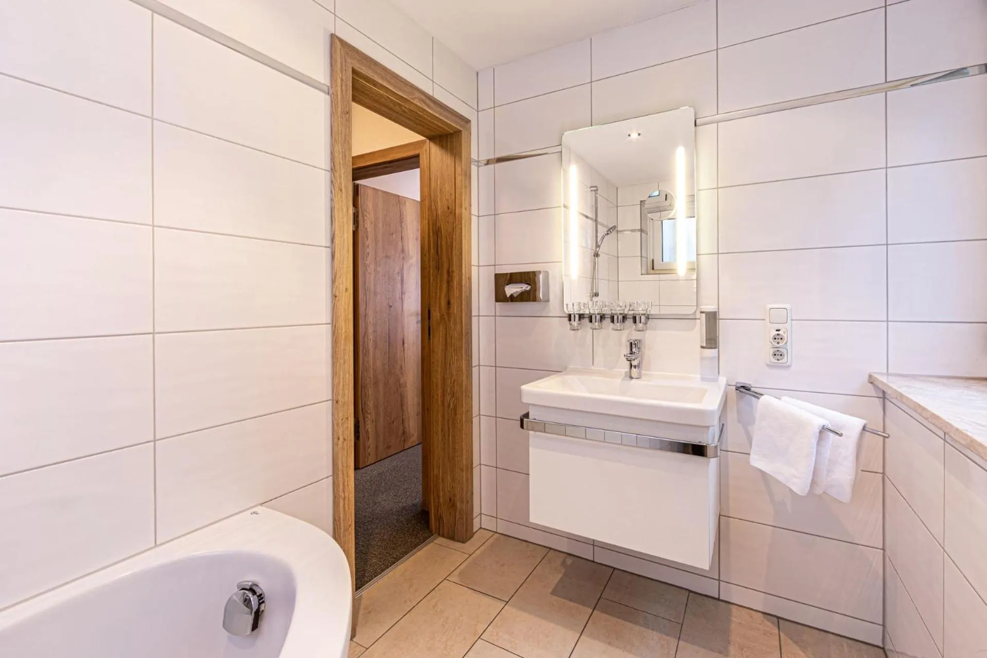 Bathroom in Hotel AlpinaRos