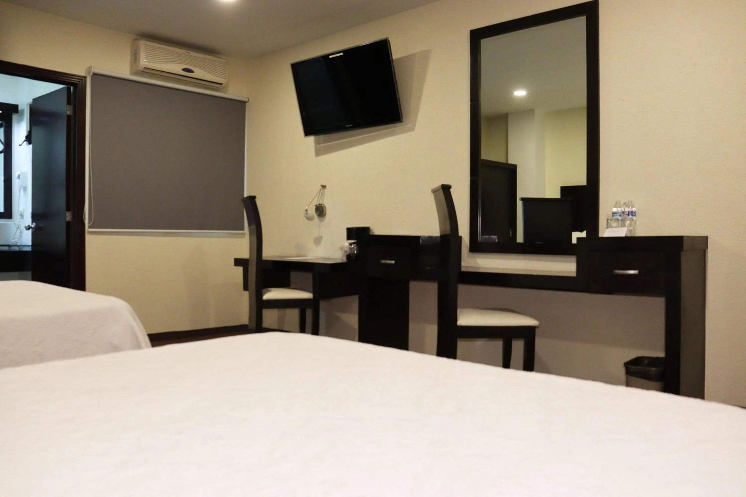 Photo of the whole room, Bed in Wyndham Garden Aguascalientes Hotel & Casino