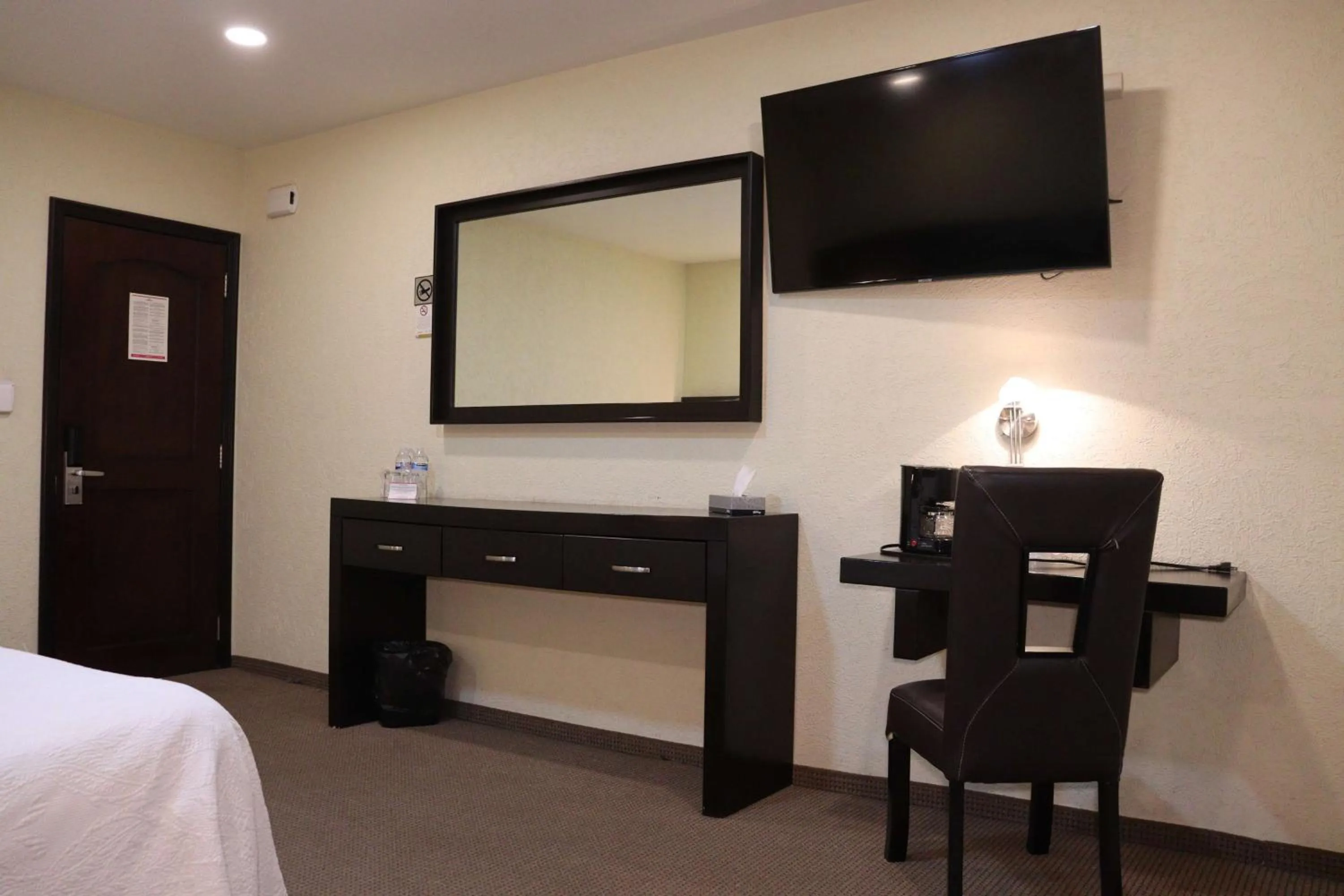 Bed in Wyndham Garden Aguascalientes Hotel & Casino