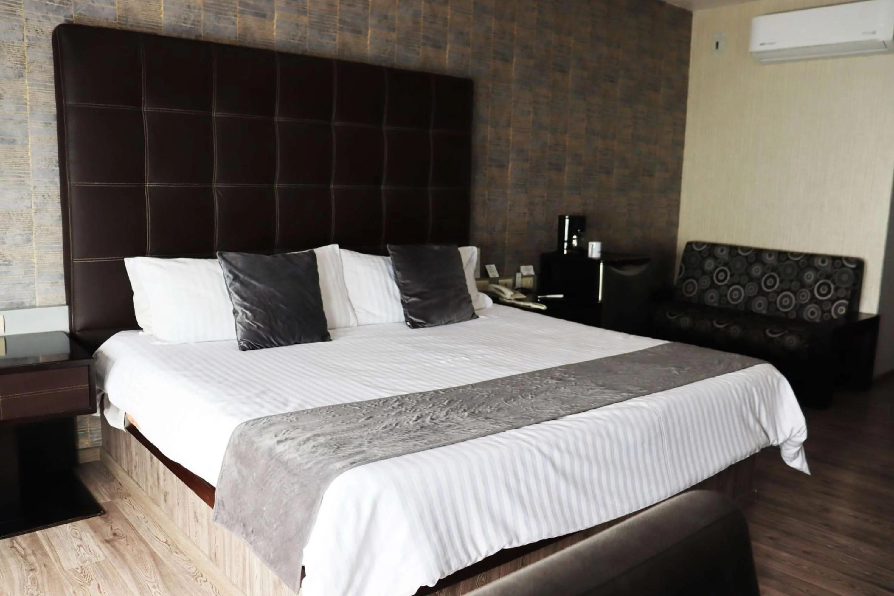 Bed in Wyndham Garden Aguascalientes Hotel & Casino