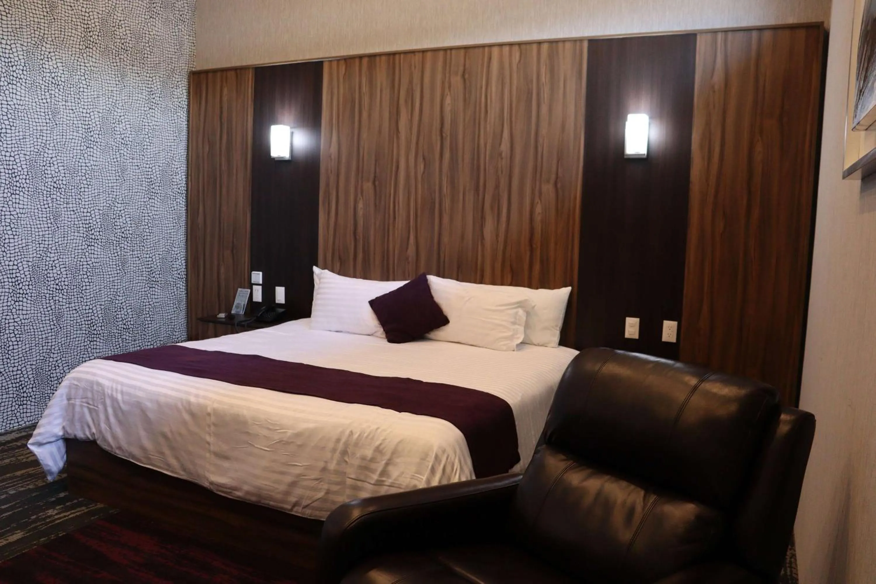 Bed in Wyndham Garden Aguascalientes Hotel & Casino