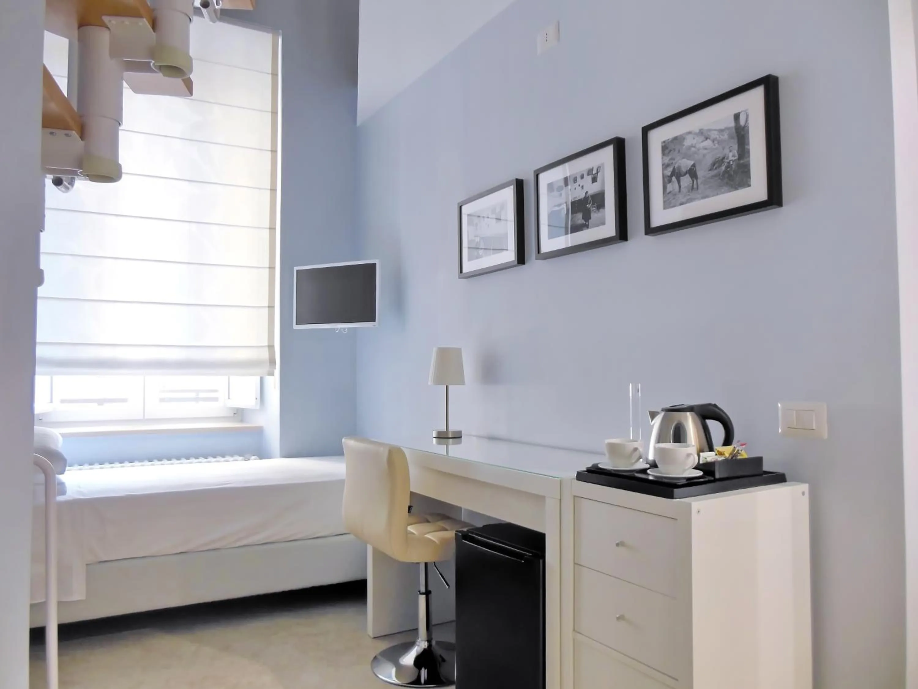 Seating area, Bed in L'OSPITE - LIFESTYLE RESIDENCE, Design Rooms