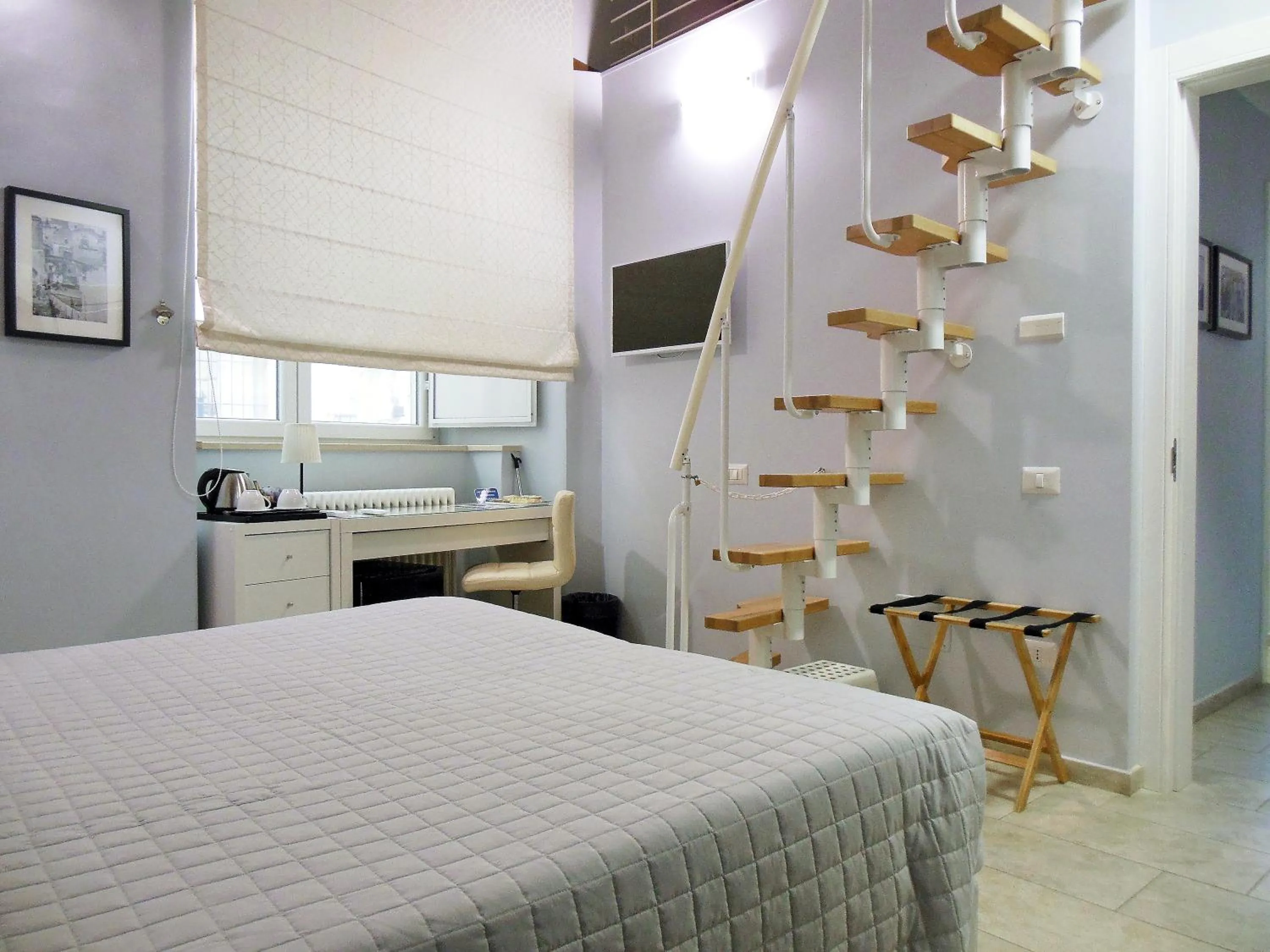 Photo of the whole room, Bed in L'OSPITE - LIFESTYLE RESIDENCE, Design Rooms