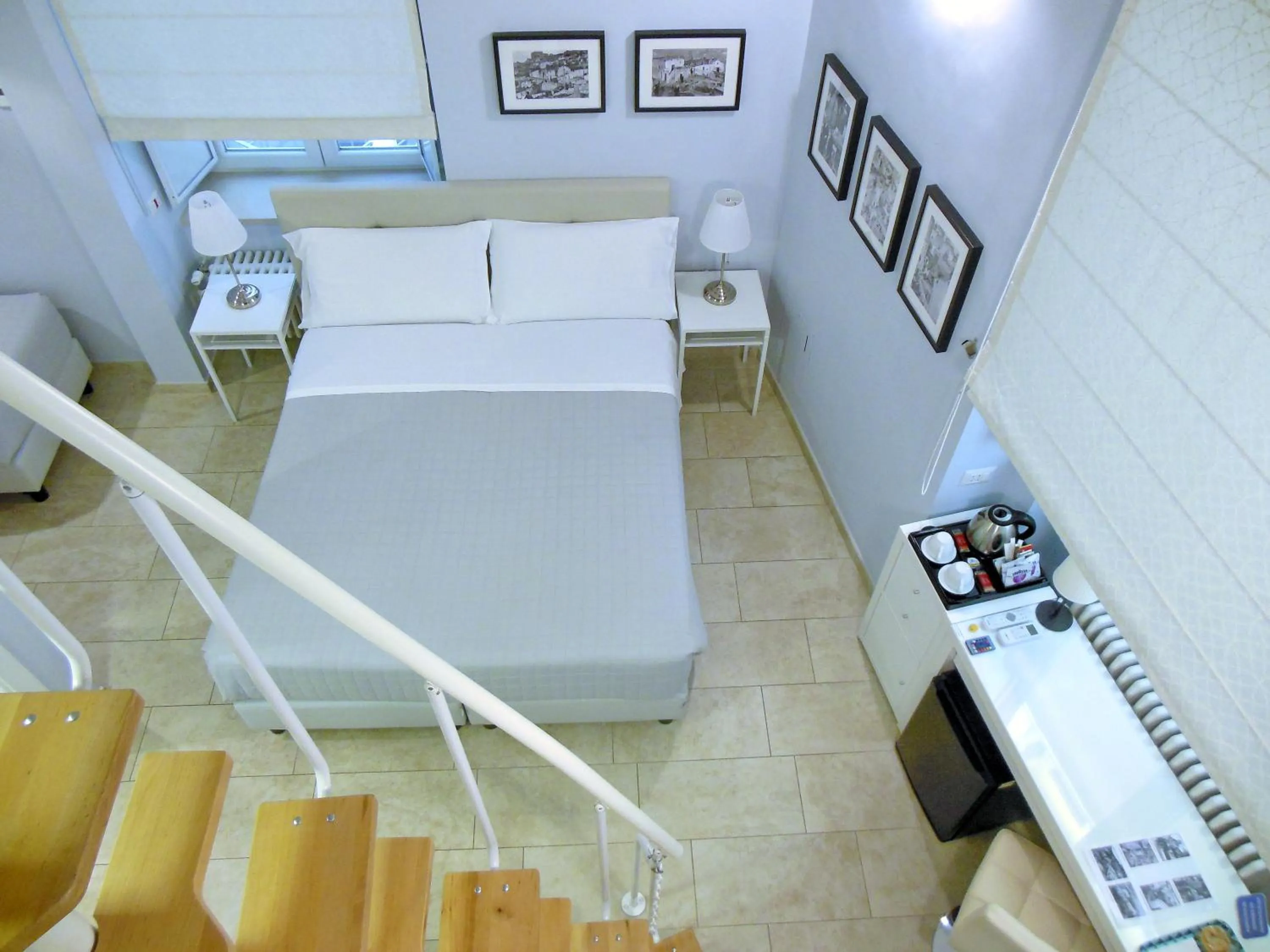 Photo of the whole room, Bed in L'OSPITE - LIFESTYLE RESIDENCE, Design Rooms