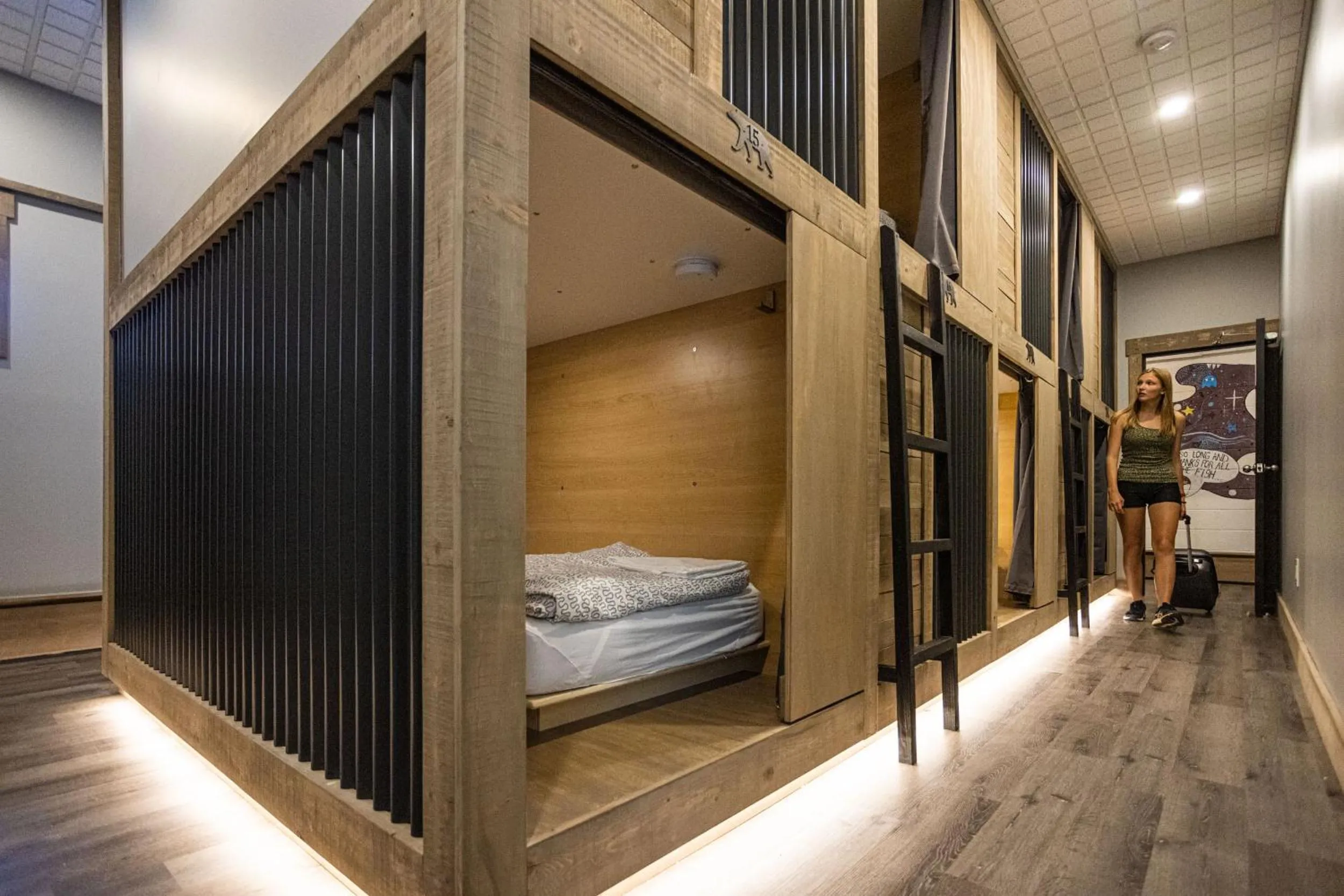 Bed in The Raging Elk Adventure Lodging