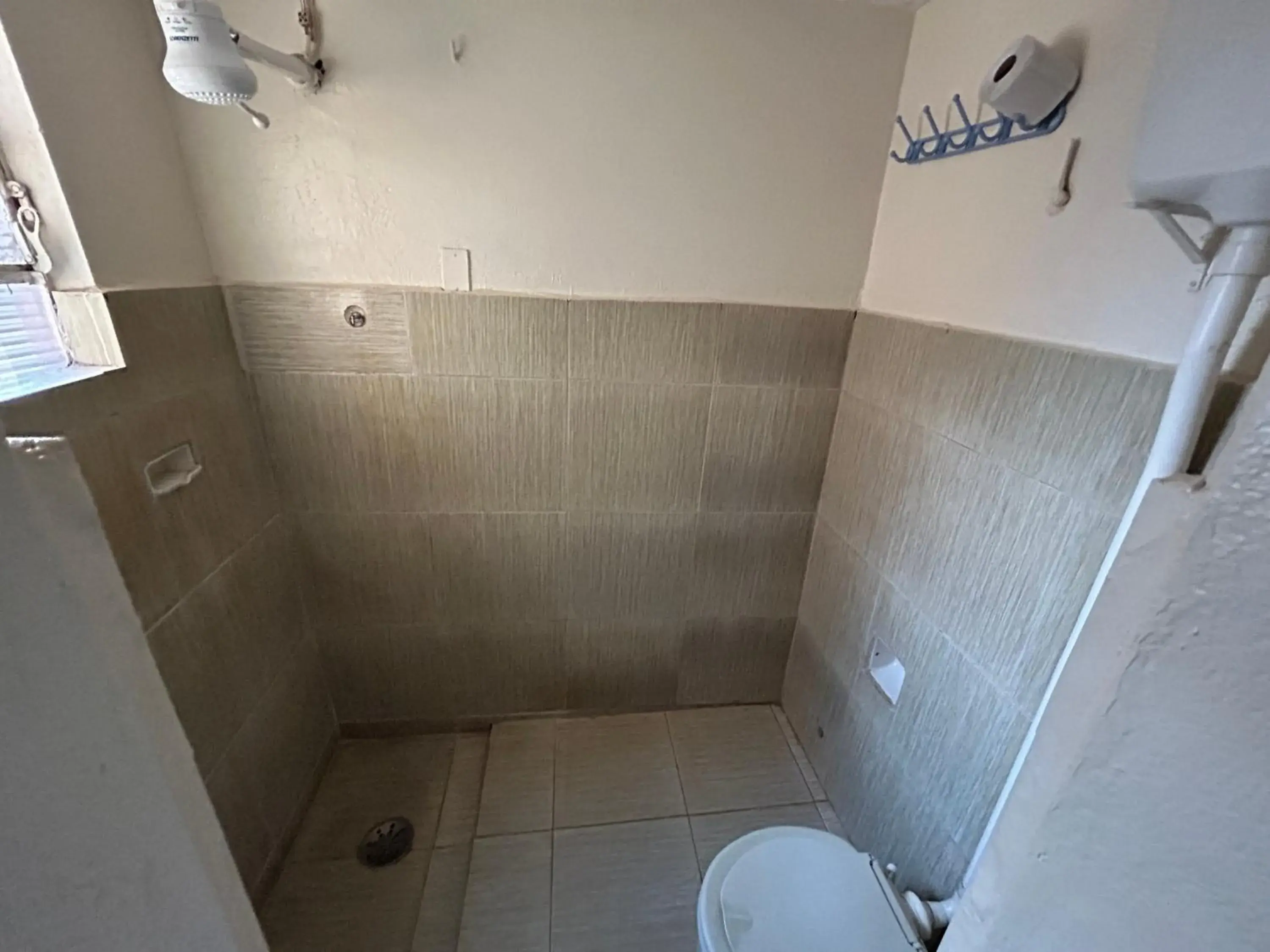 Quadruple Room with Private Bathroom - single occupancy in Hotel Santa Marta Quadruple Room with Private Bathroom - single occupancy in Hotel Santa Marta