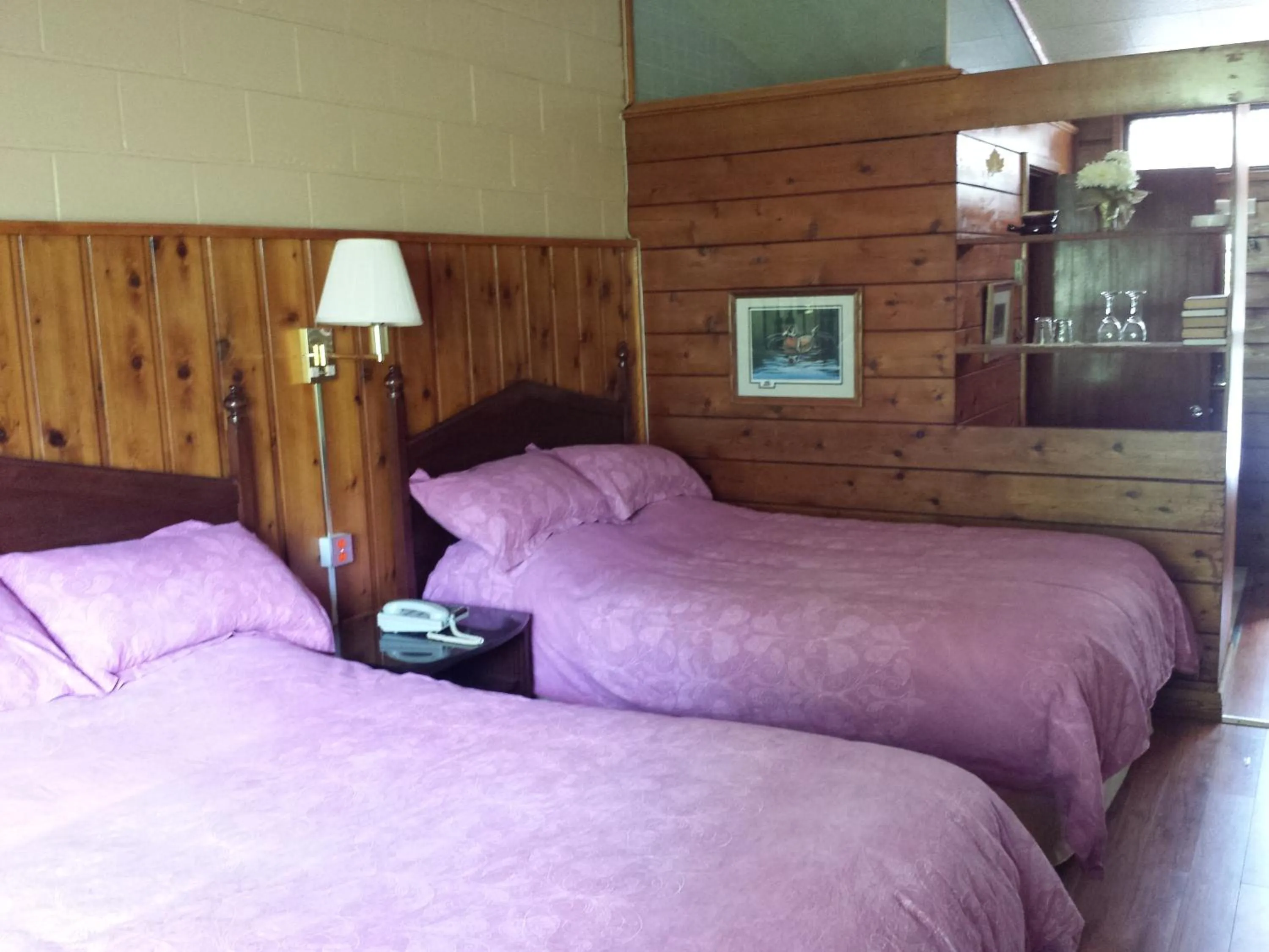 Bed in Motel Le Charentais