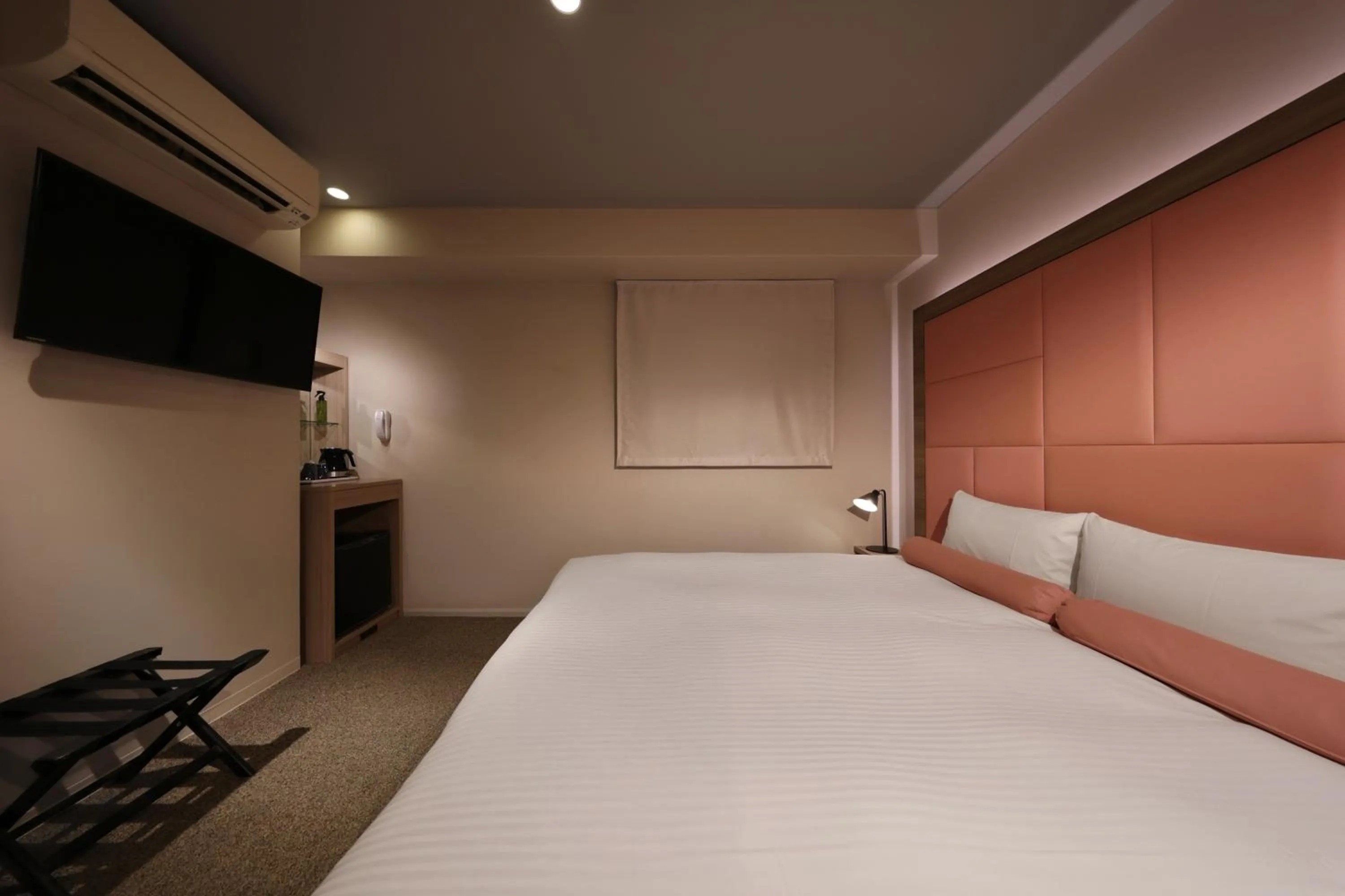 Bed in Doutonbori Crystal Hotel