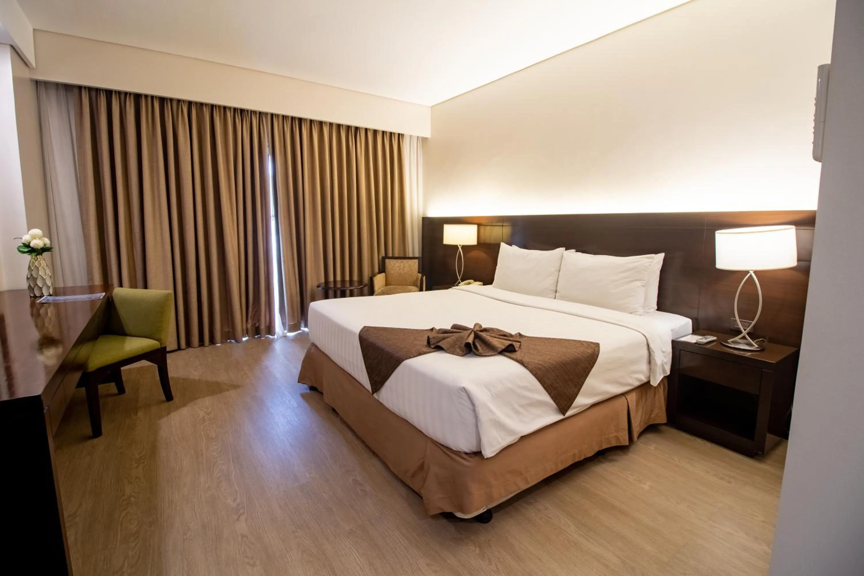 Bed in Harolds Hotel Cebu