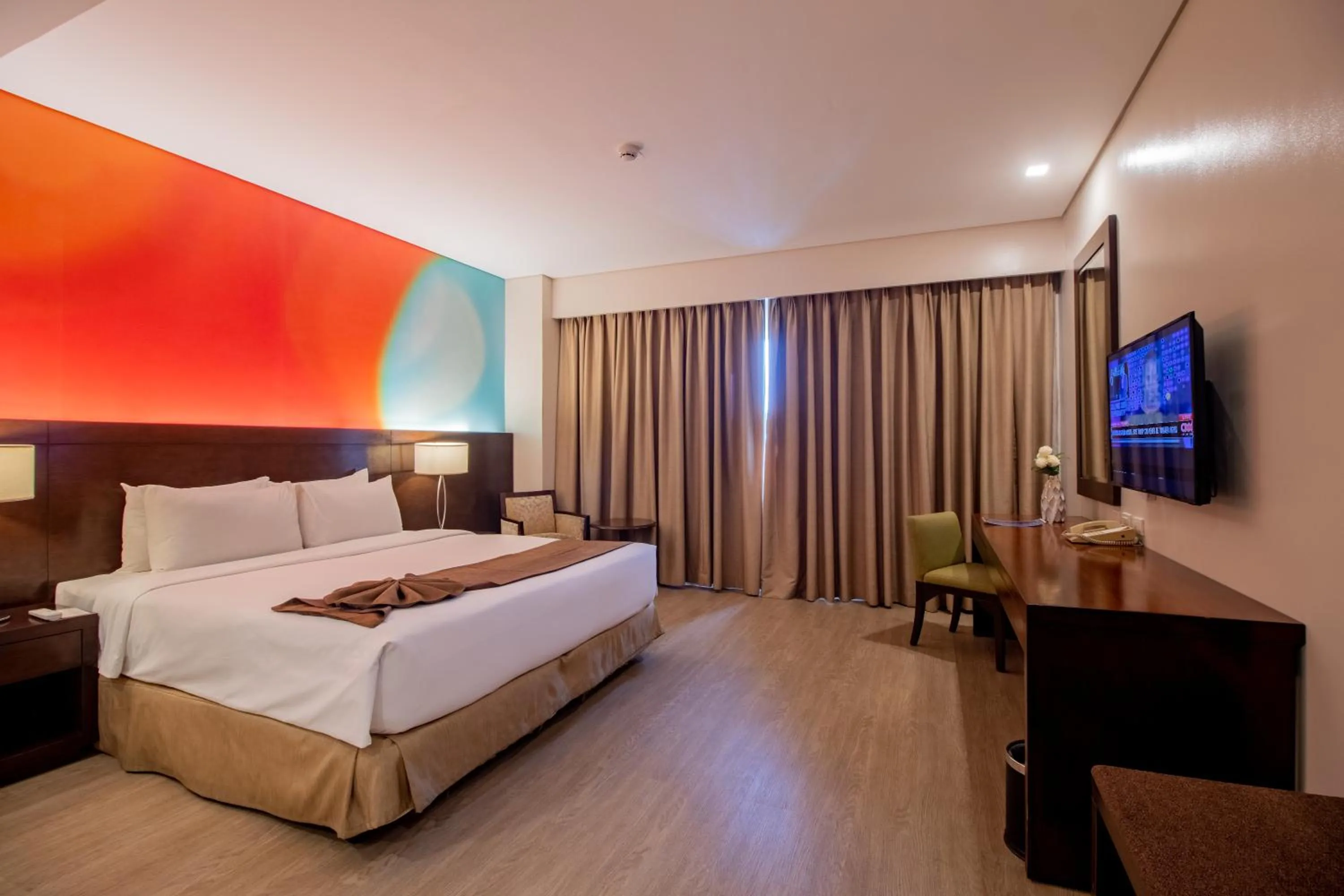 Photo of the whole room, Bed in Harolds Hotel Cebu