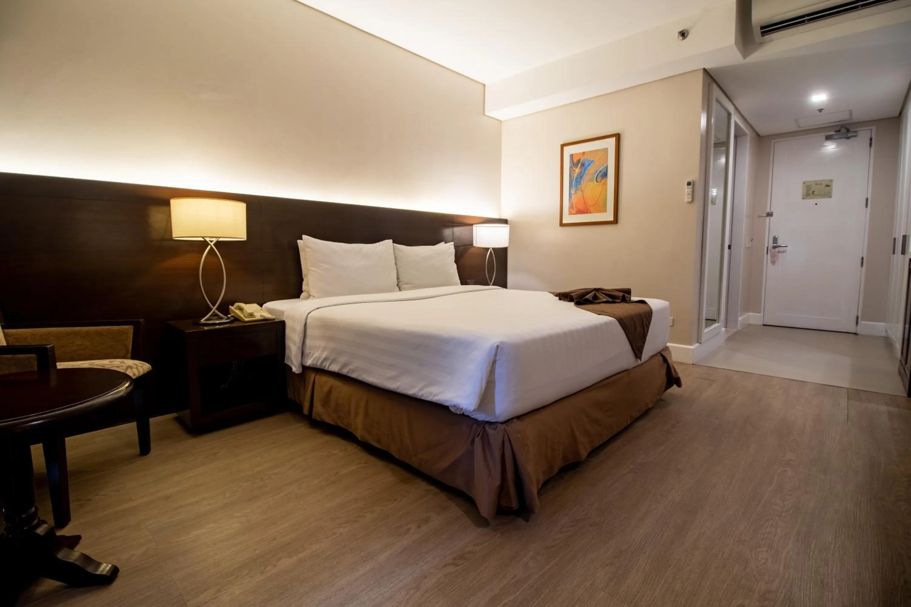 Photo of the whole room, Bed in Harolds Hotel Cebu