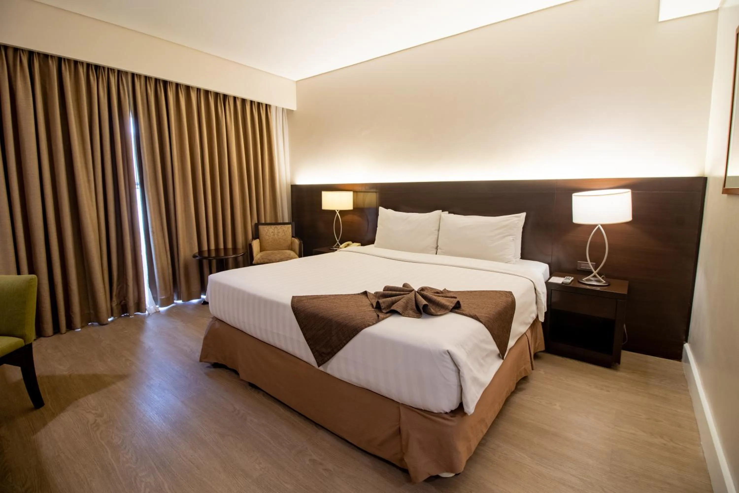 Bed in Harolds Hotel Cebu