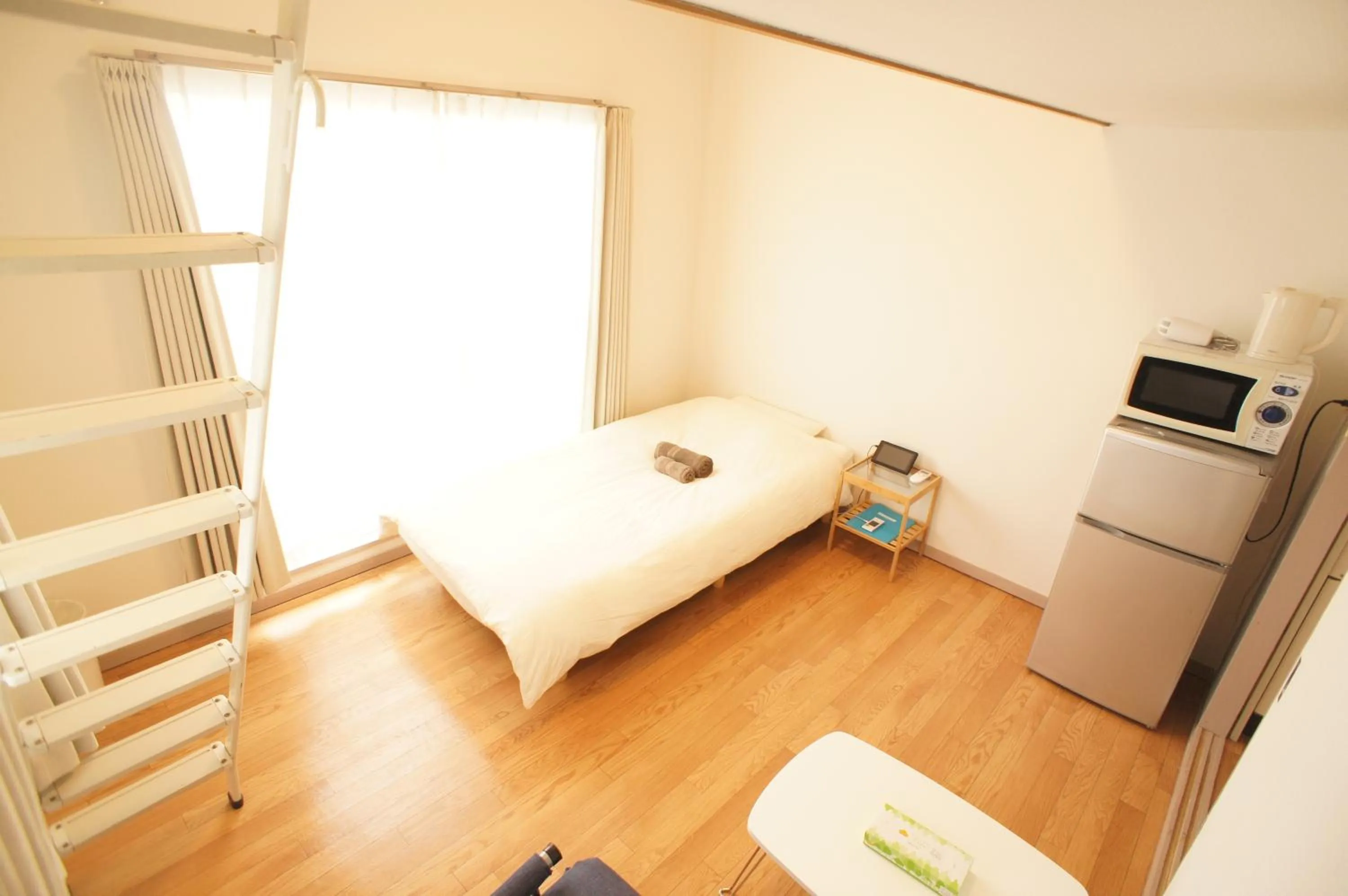 Photo of the whole room, Bed in Plusone Fujisaki