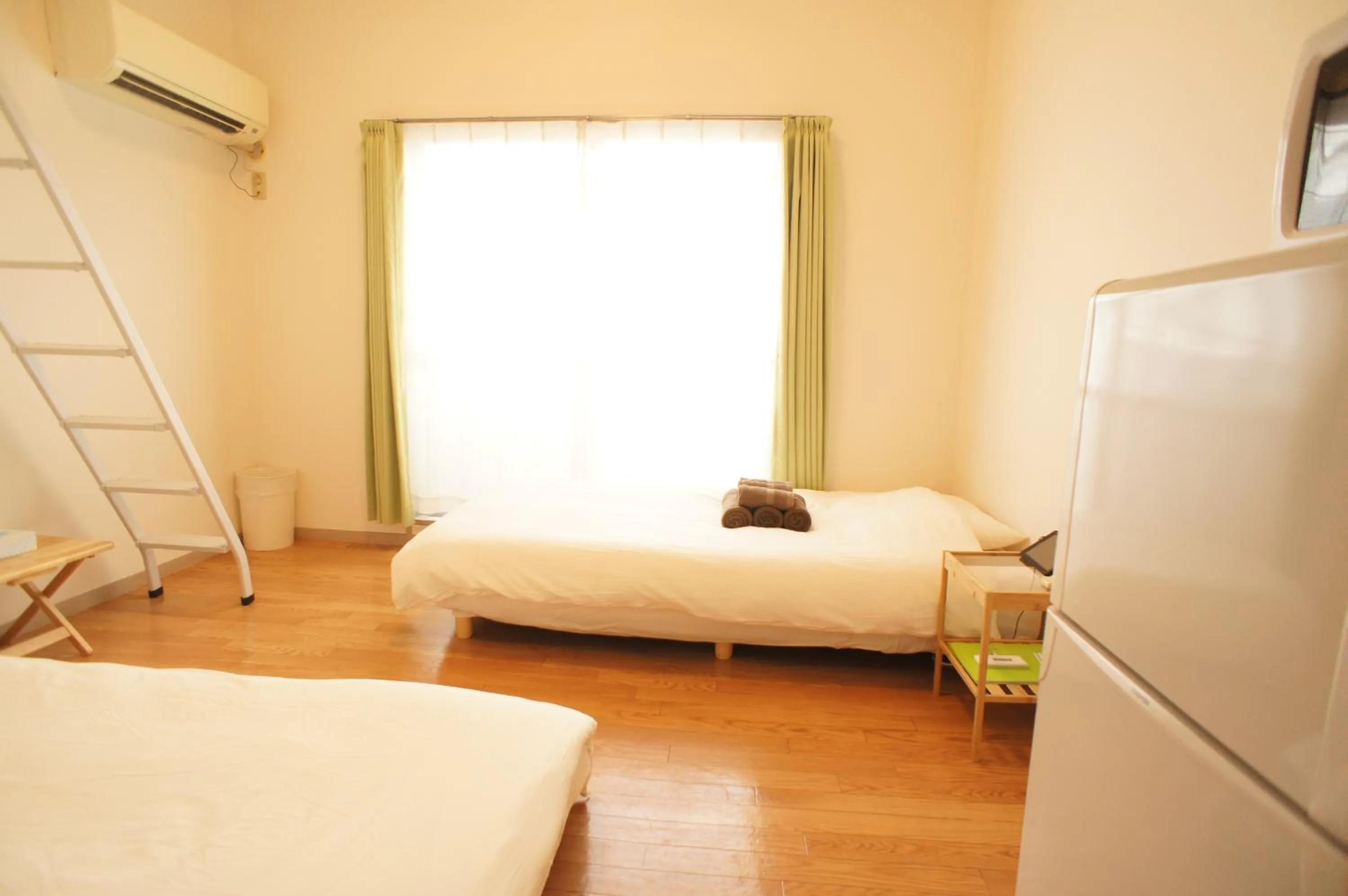 Photo of the whole room, Bed in Plusone Fujisaki