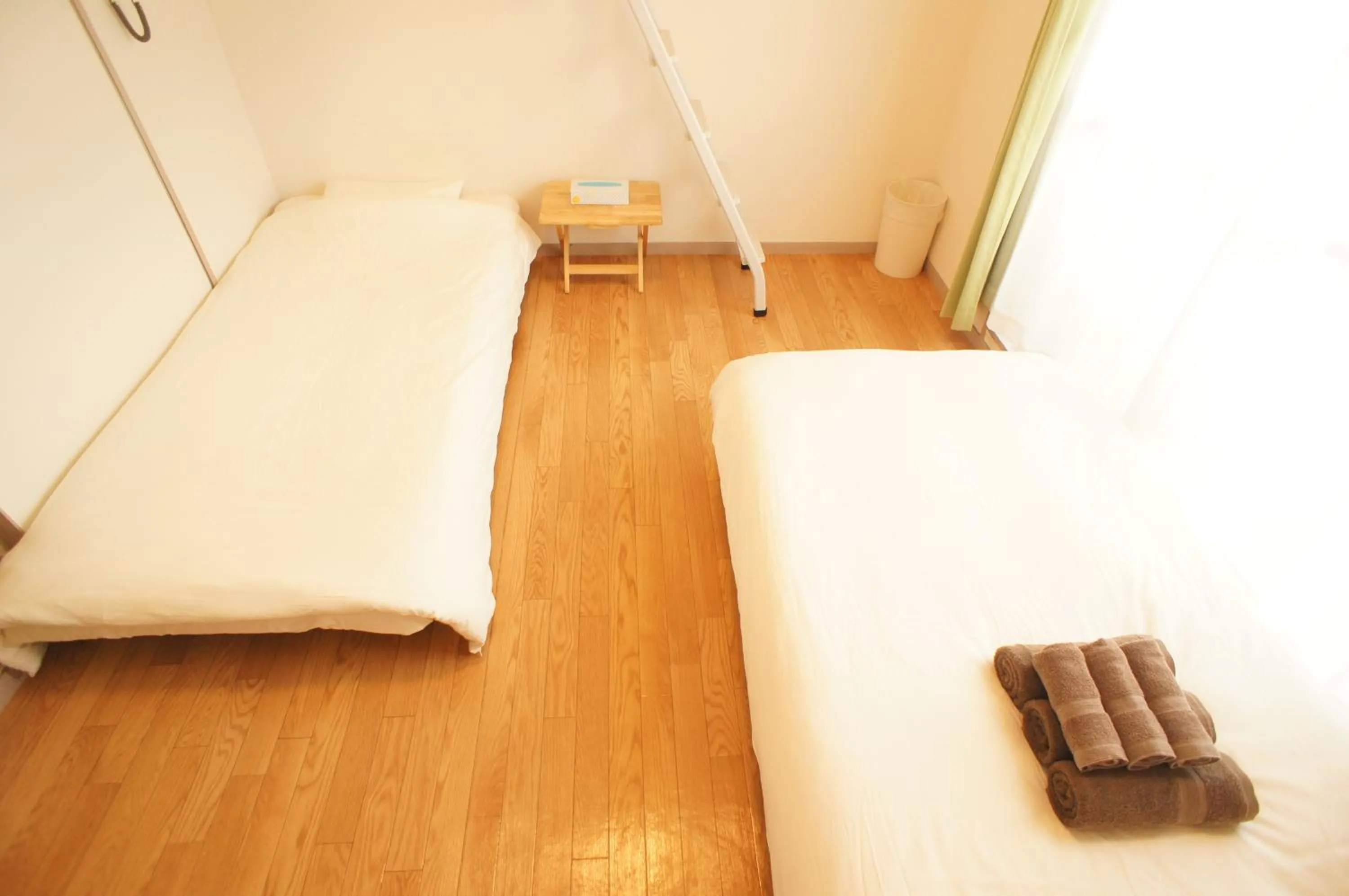 Photo of the whole room, Bed in Plusone Fujisaki