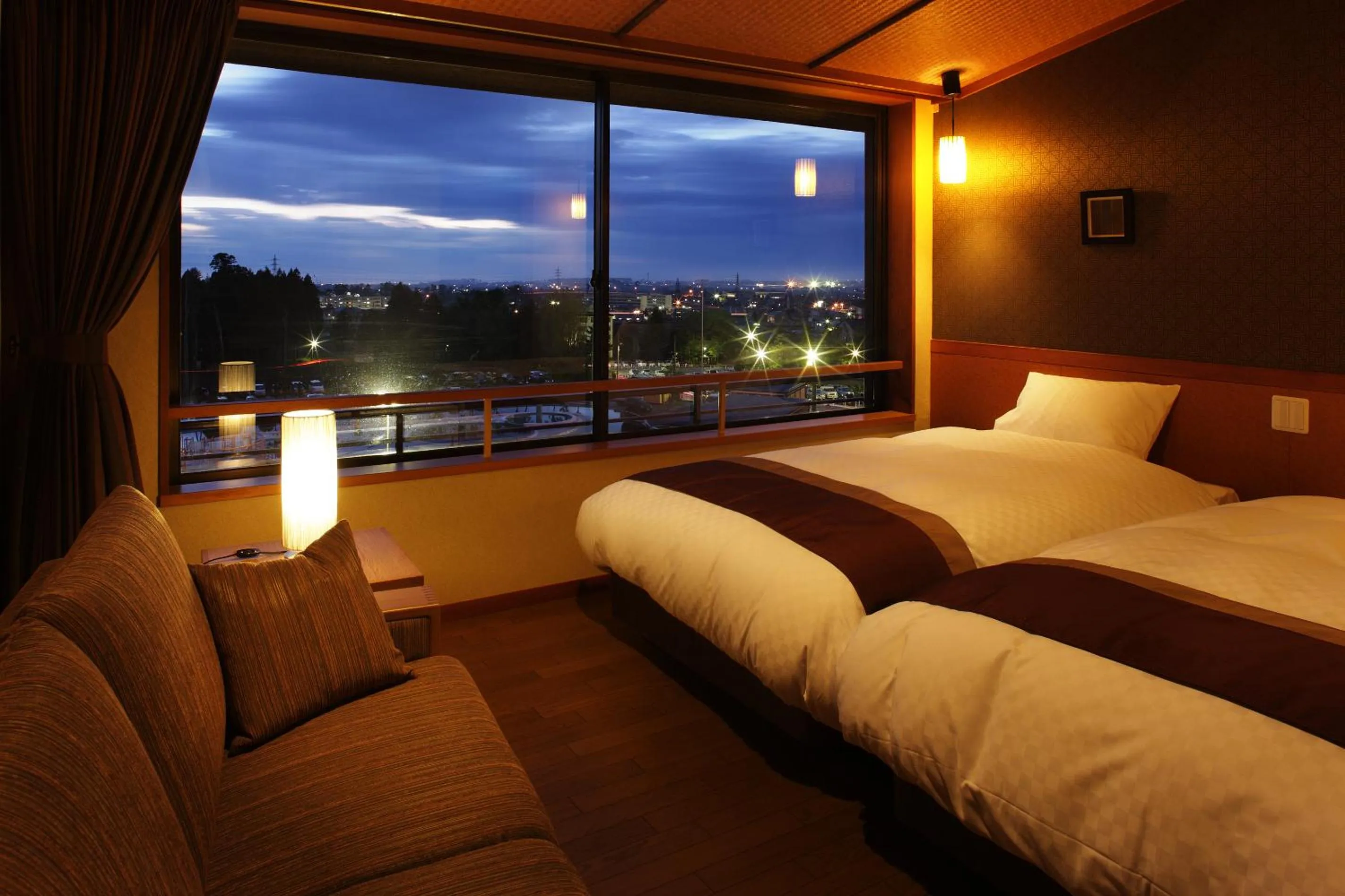Bed in Kintarou Onsen Hotel