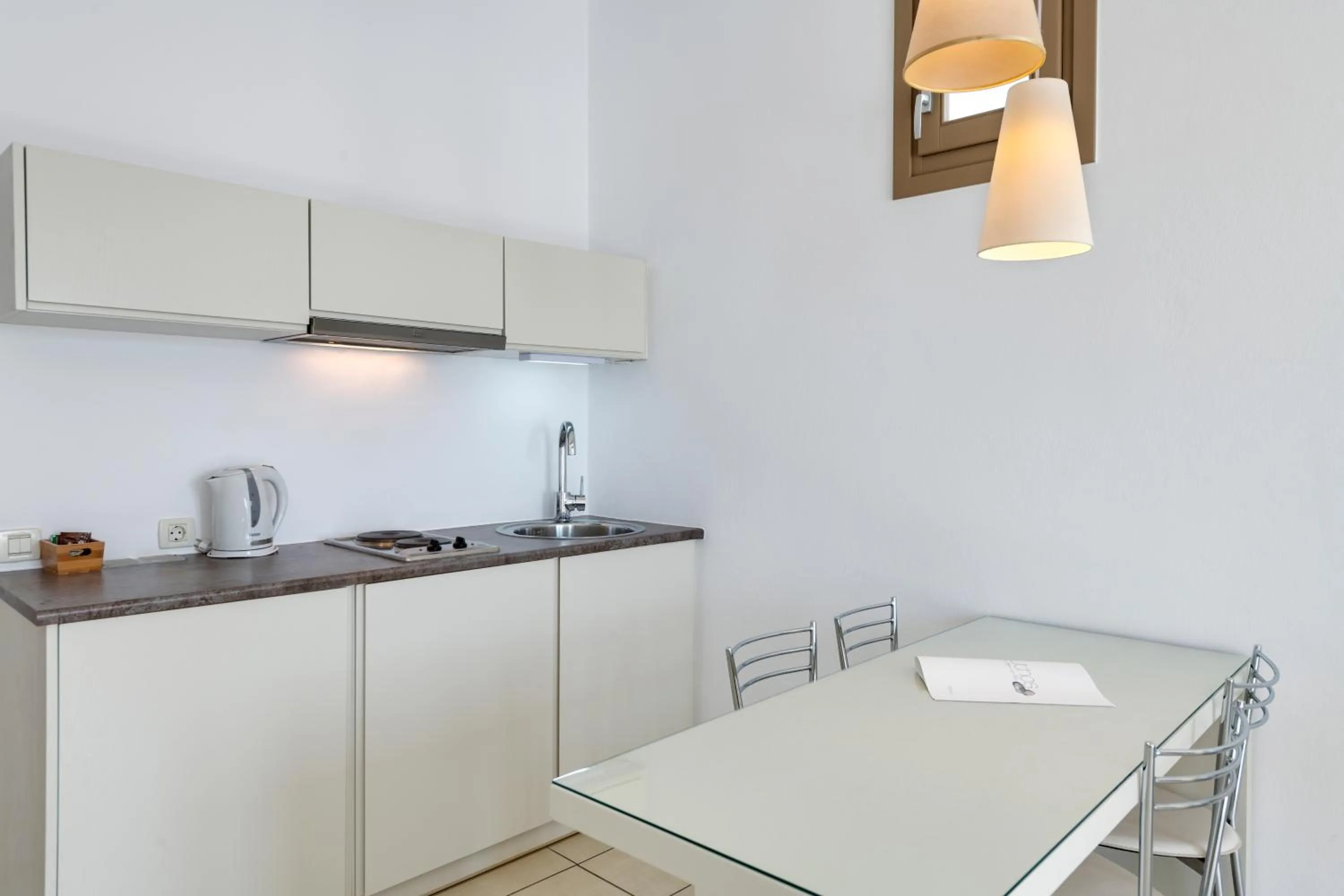 Kitchen or kitchenette in Lithos by Spyros & Flora