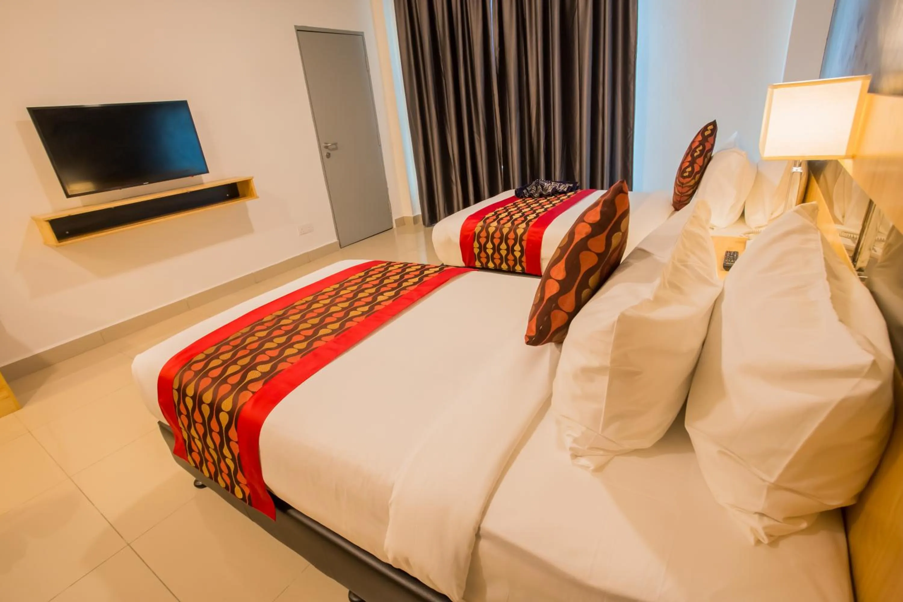 Bed in Hotel Adya Express Chenang