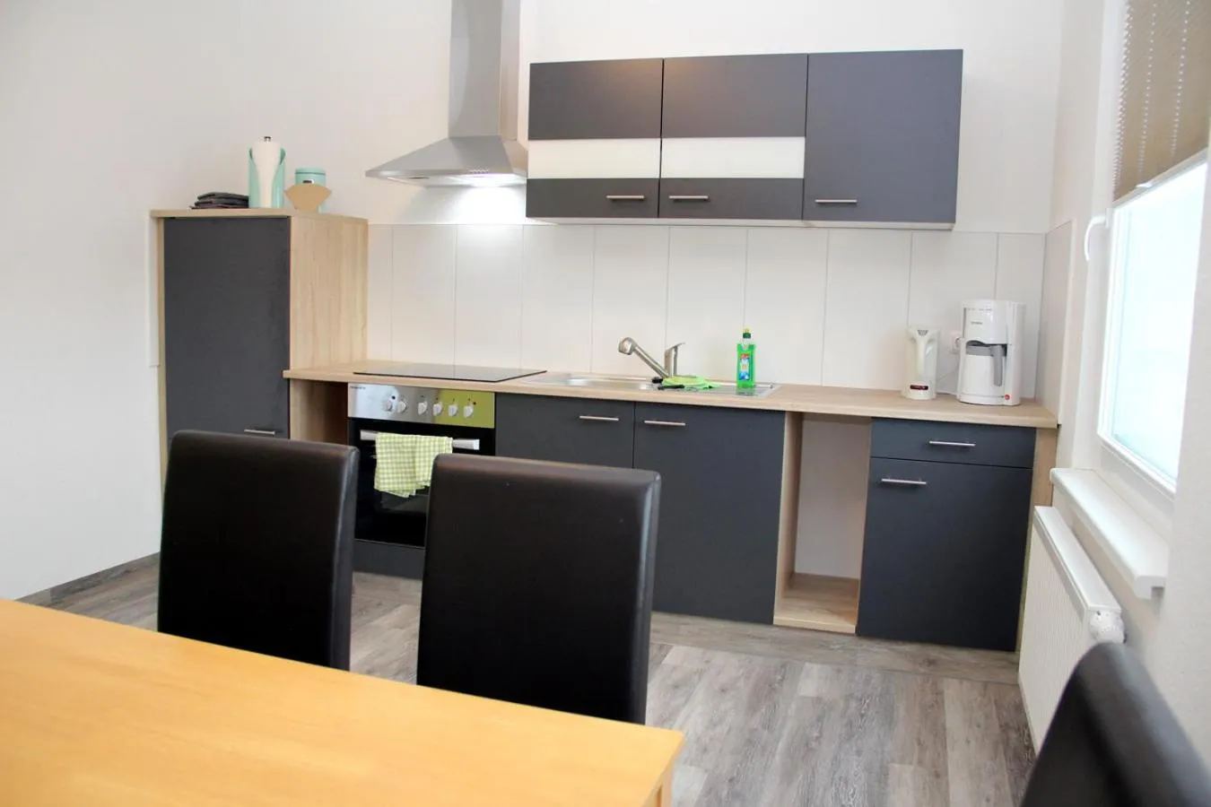 Kitchen or kitchenette in Hotel Bannewitz B&B