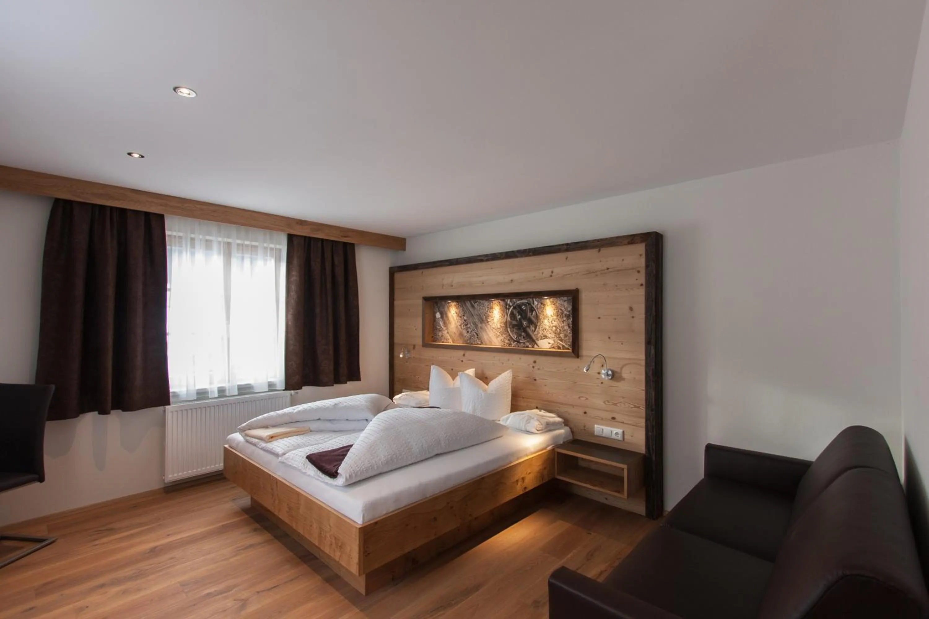 Photo of the whole room, Bed in Posthotel Pfunds