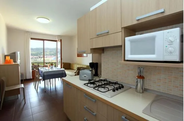 Kitchen or kitchenette in Residence Corte Camaldoli
