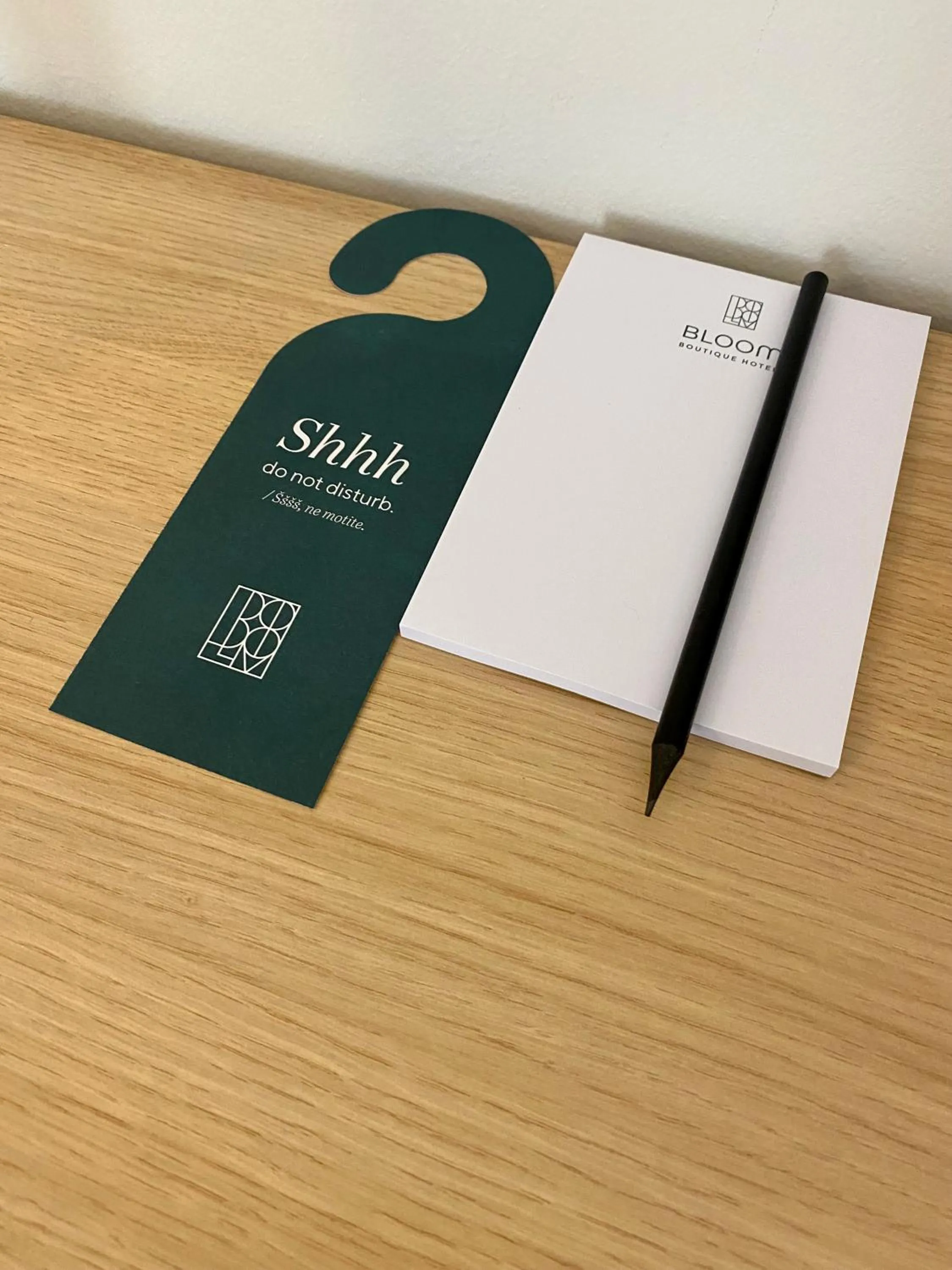 Property logo or sign in Adora Hotel