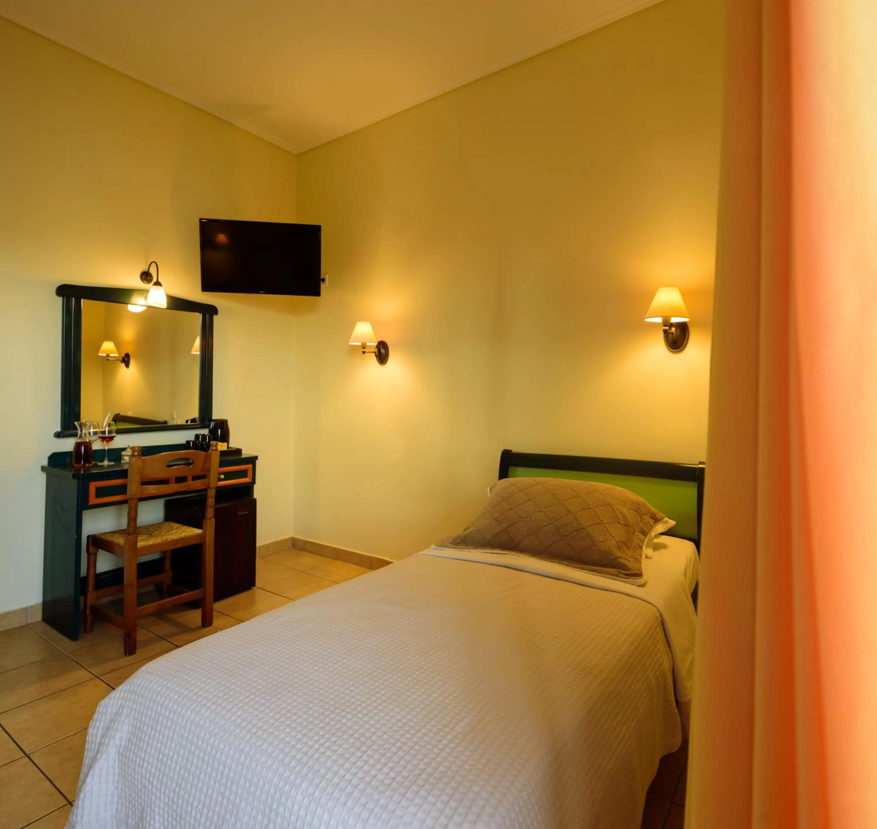 Bed in Karidis Hotel