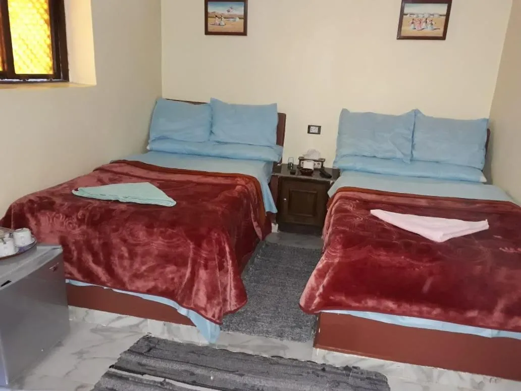 Bed in Maghrabi's Guest house