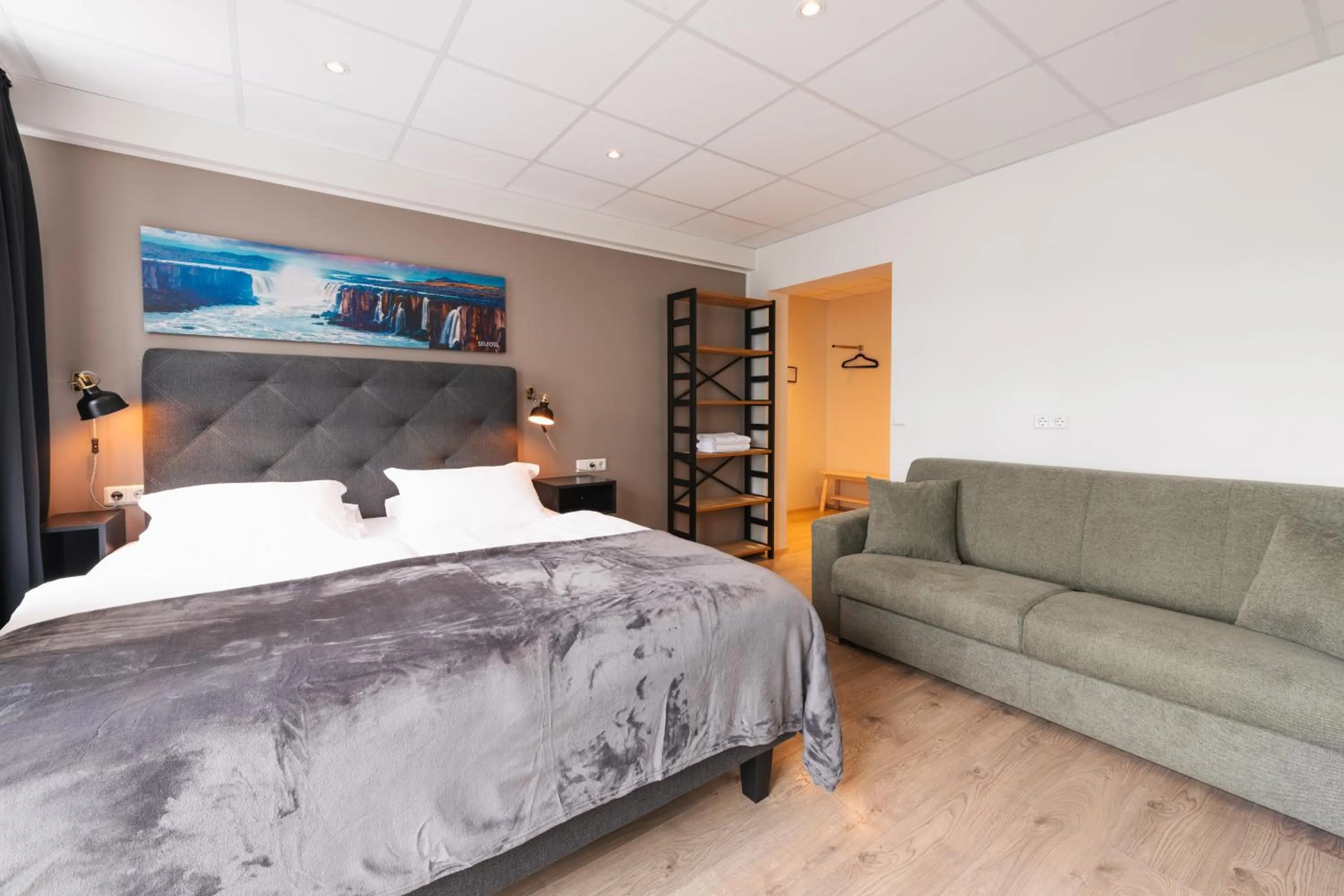 Seating area, Bed in Centrum Hotel