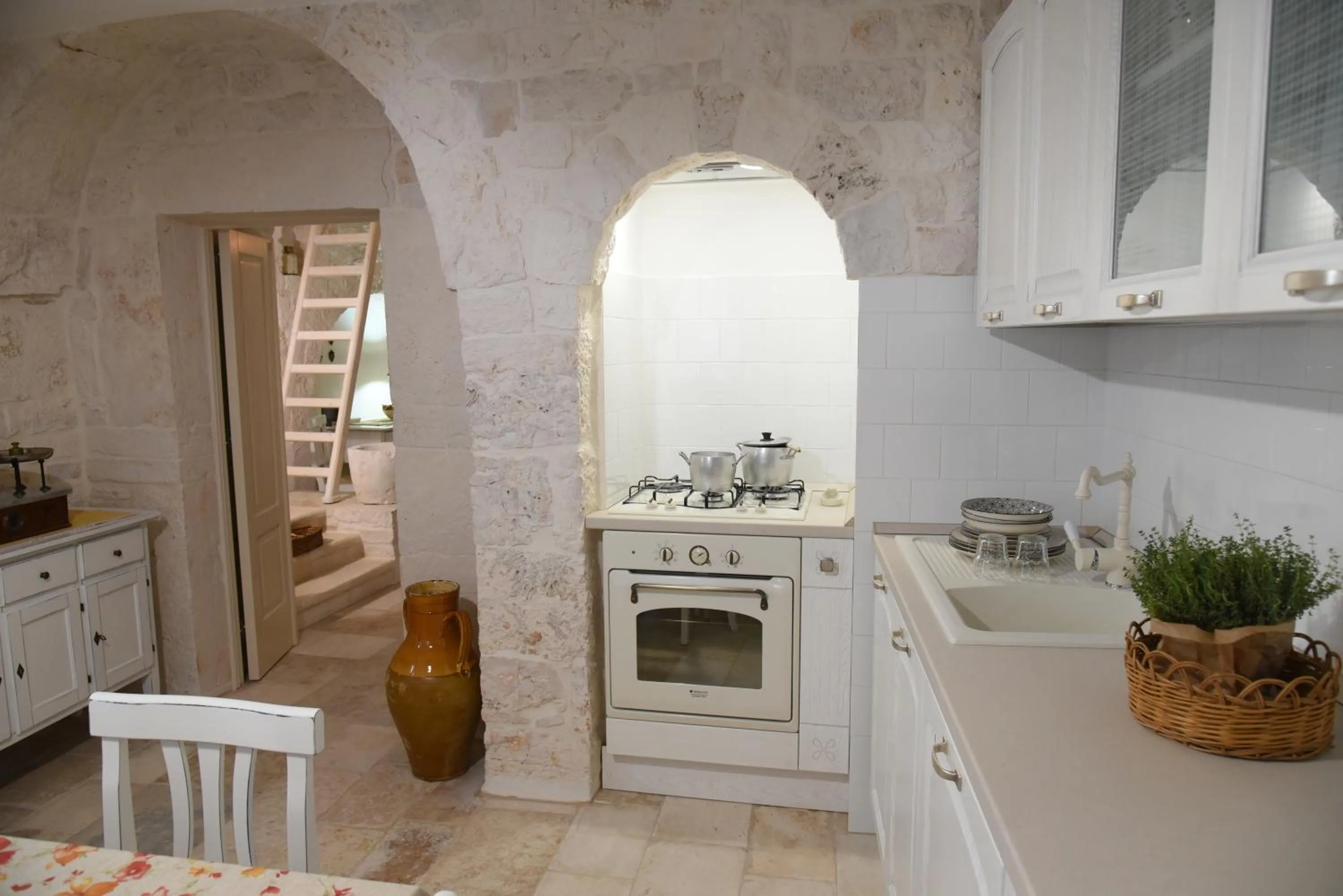 Kitchen or kitchenette in Trulli Occhi Di Pietra