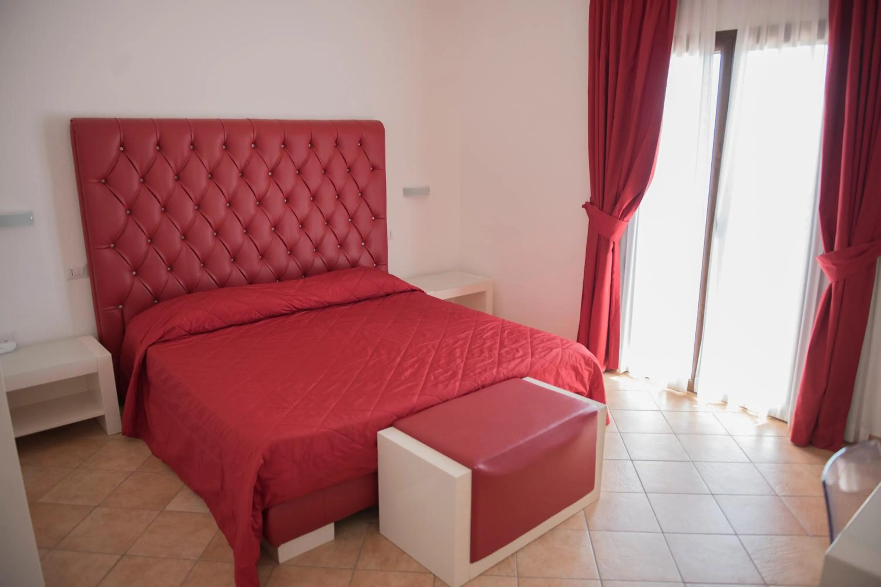 Bed in Hotel Caluna Charme