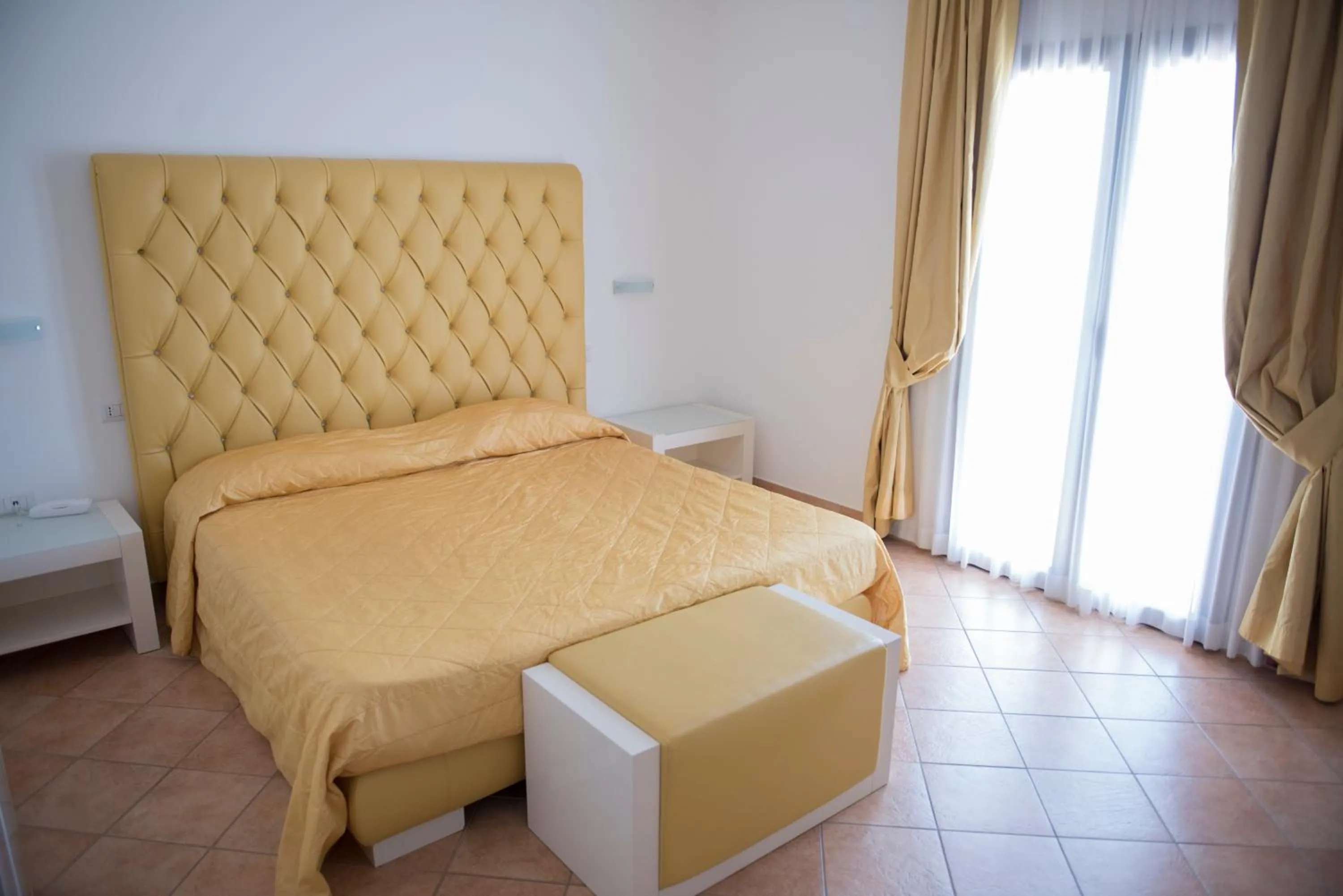 Bed in Hotel Caluna Charme