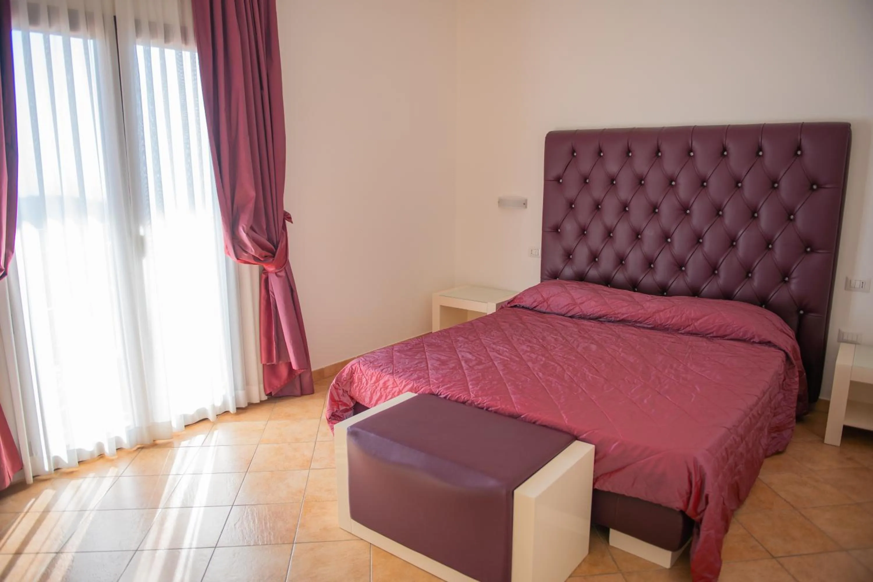 Bed in Hotel Caluna Charme