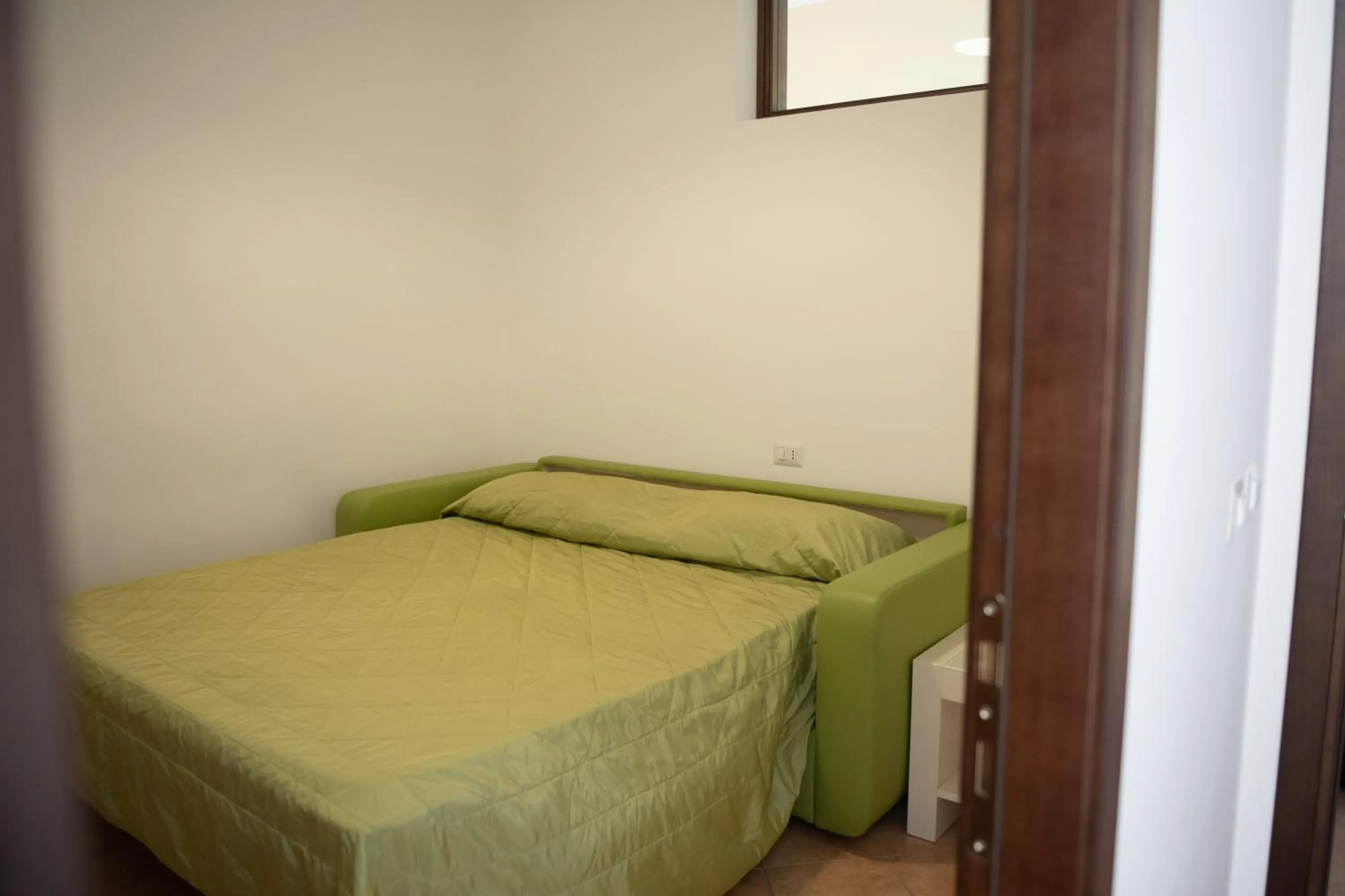 Bed in Hotel Caluna Charme