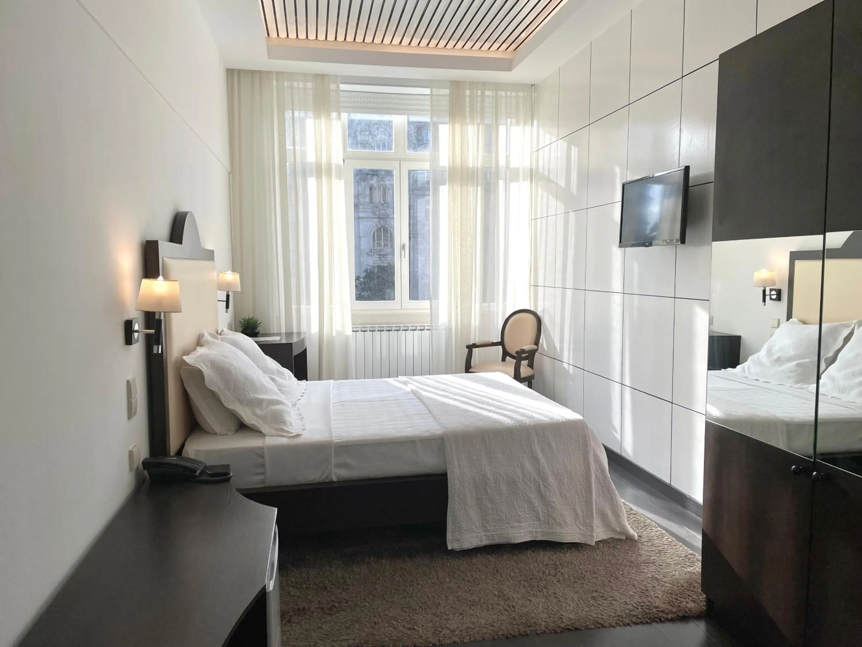 Bed in Hotel Universal